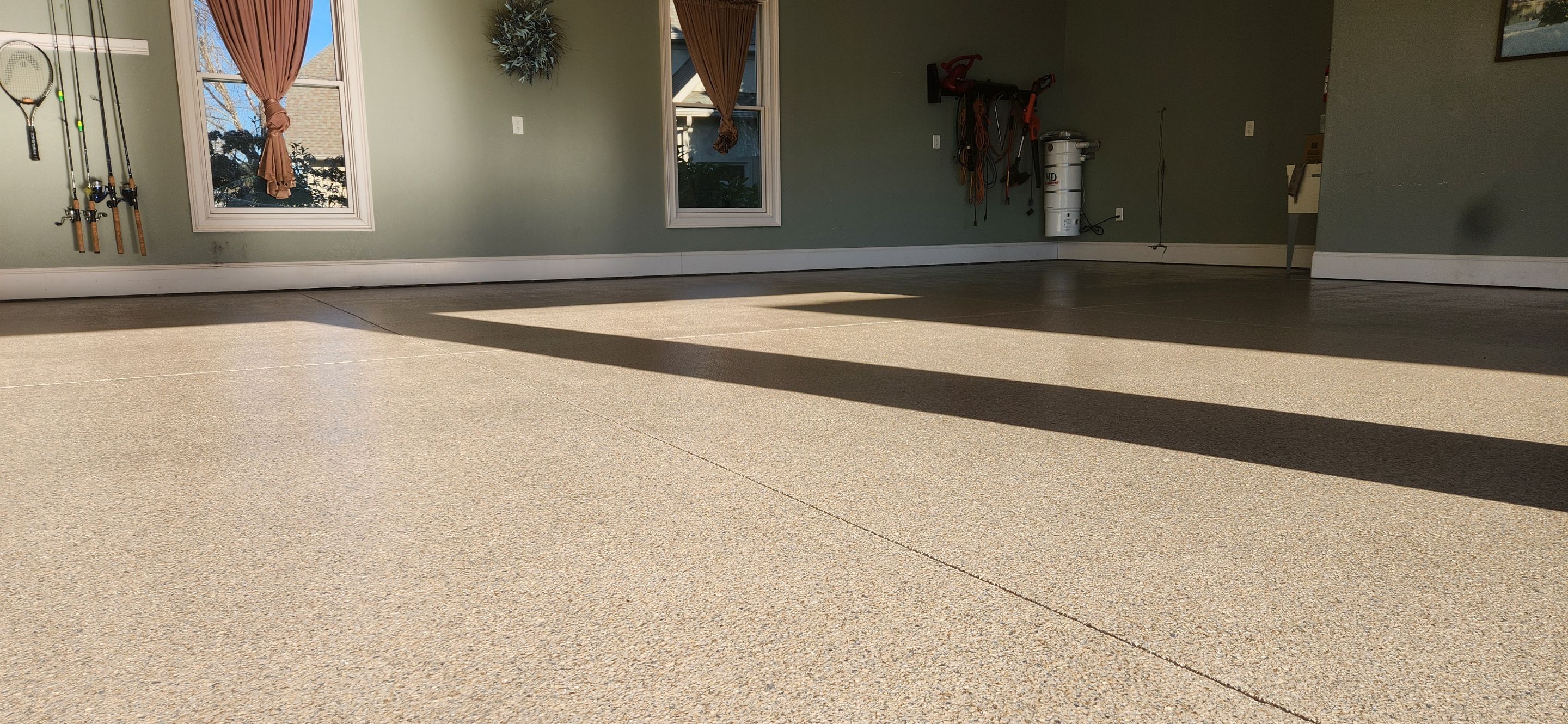 Garage & Back Patio Upgrade with Obsidian & Garnet by Elite Floor Solutions