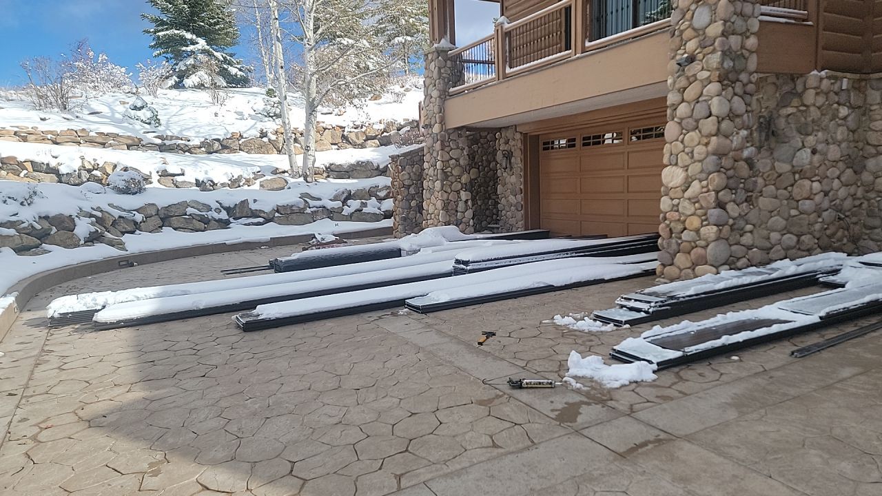 Standing Seam Metal Roof Replacement After Snow Damage by ASAP Roofing & Restoration