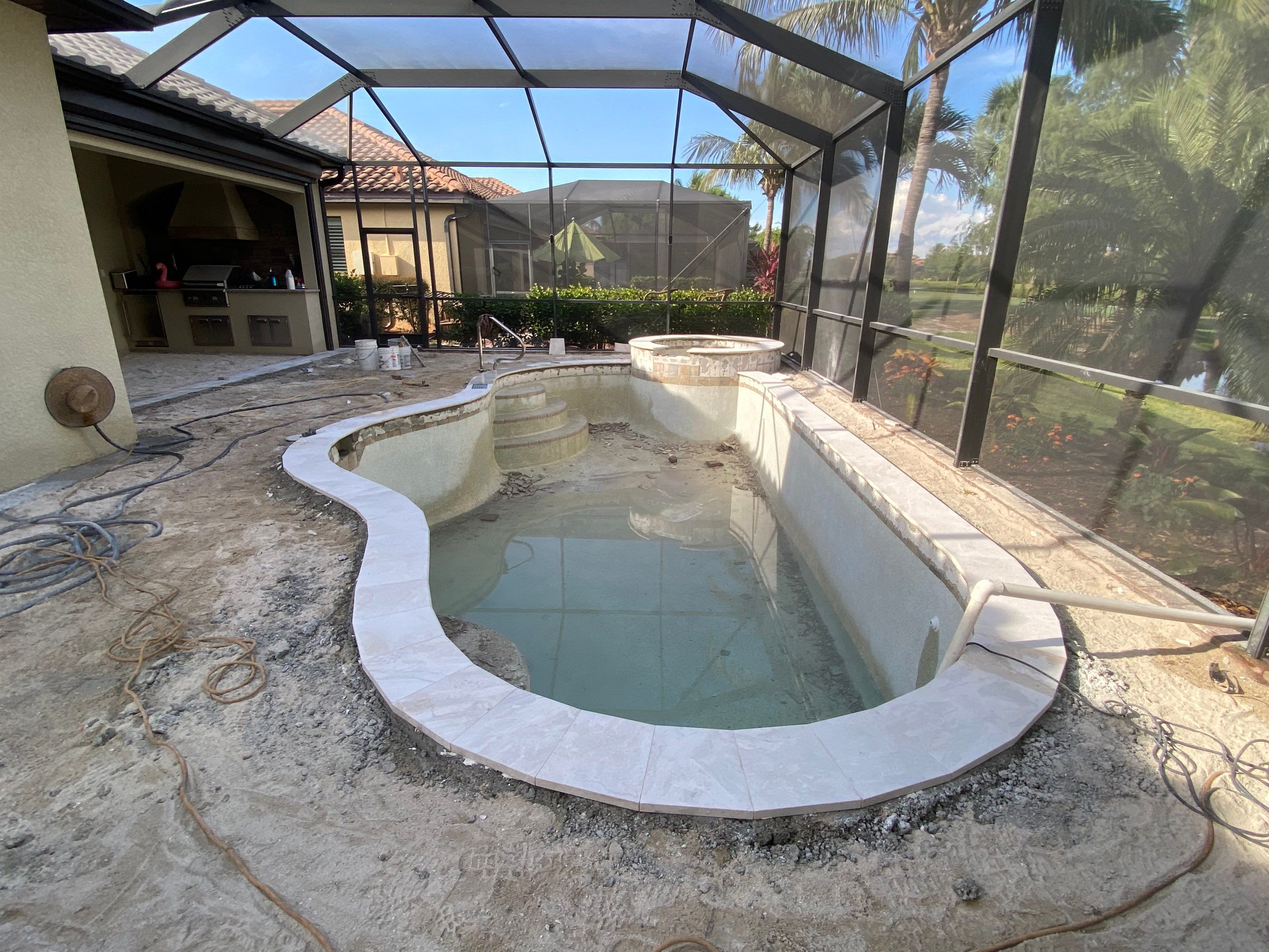 Textured Marble Pool Deck - Bonita National Golf & Country Club by Old Town Pavers Llc