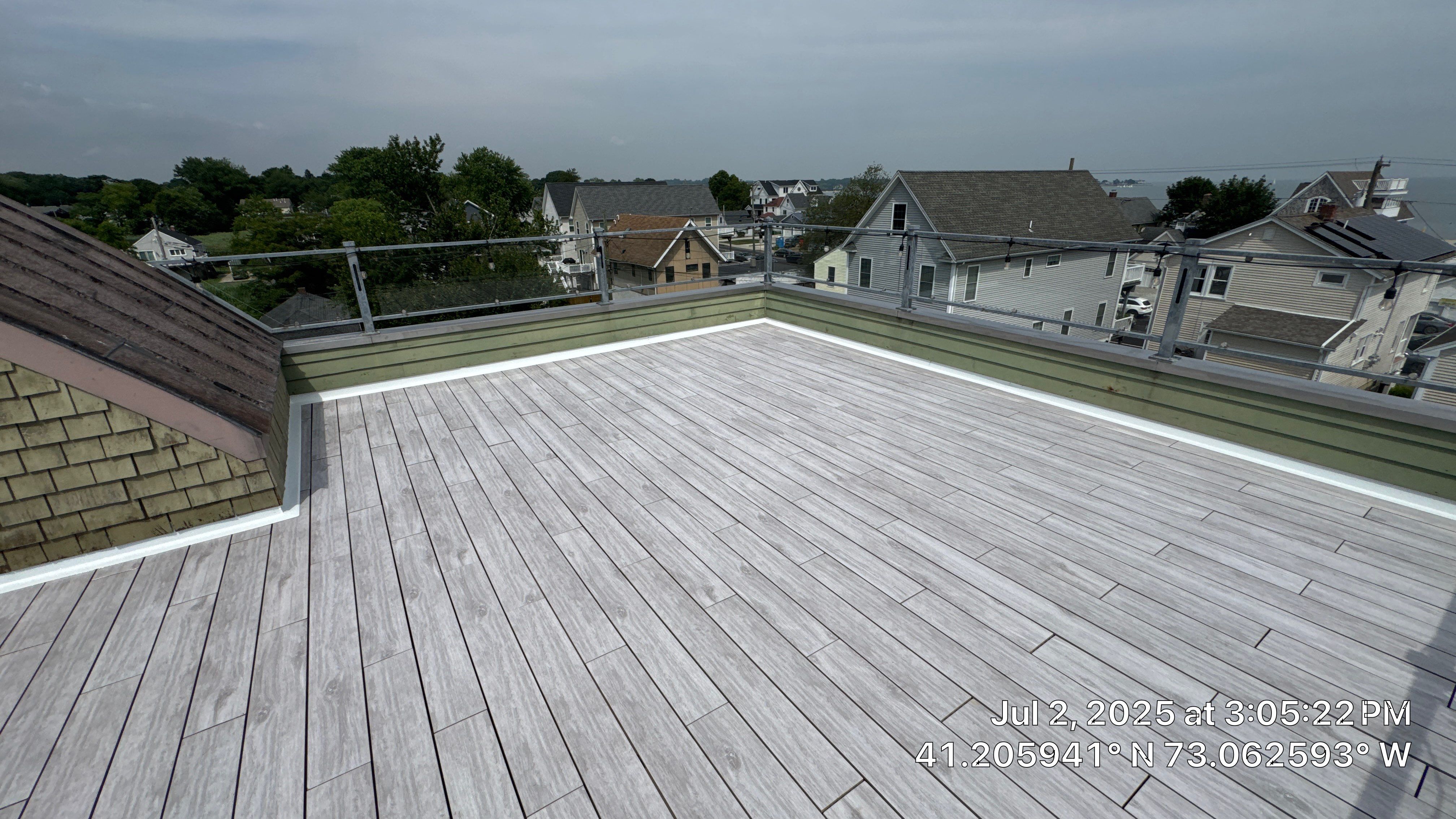 Deck Installation using Tanzite Stone Decking by A Plus Exterior