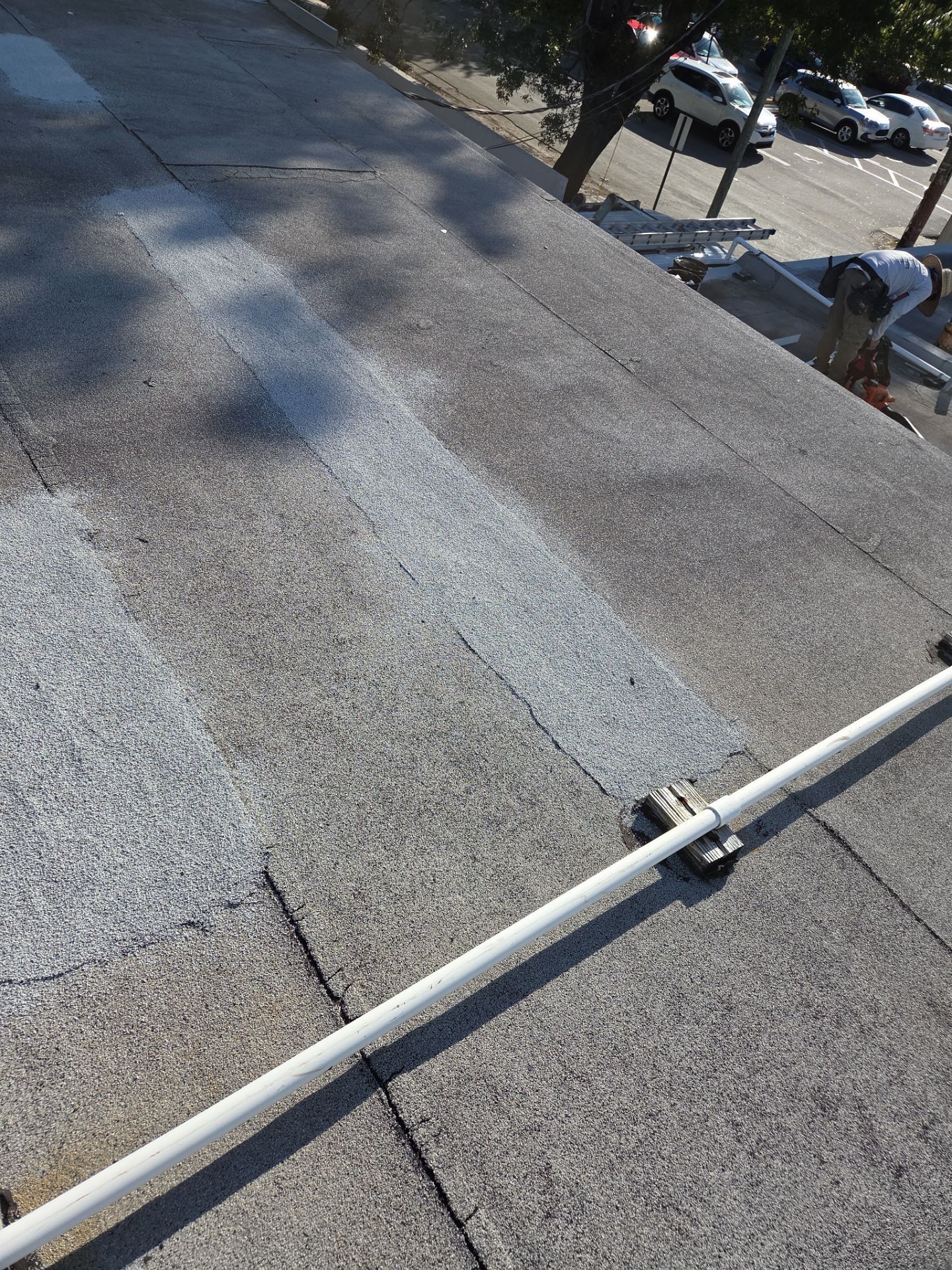 Commercial Flat Roof Restoration Using Silicone Coating in Hallandale Beach by Aastro Roofing