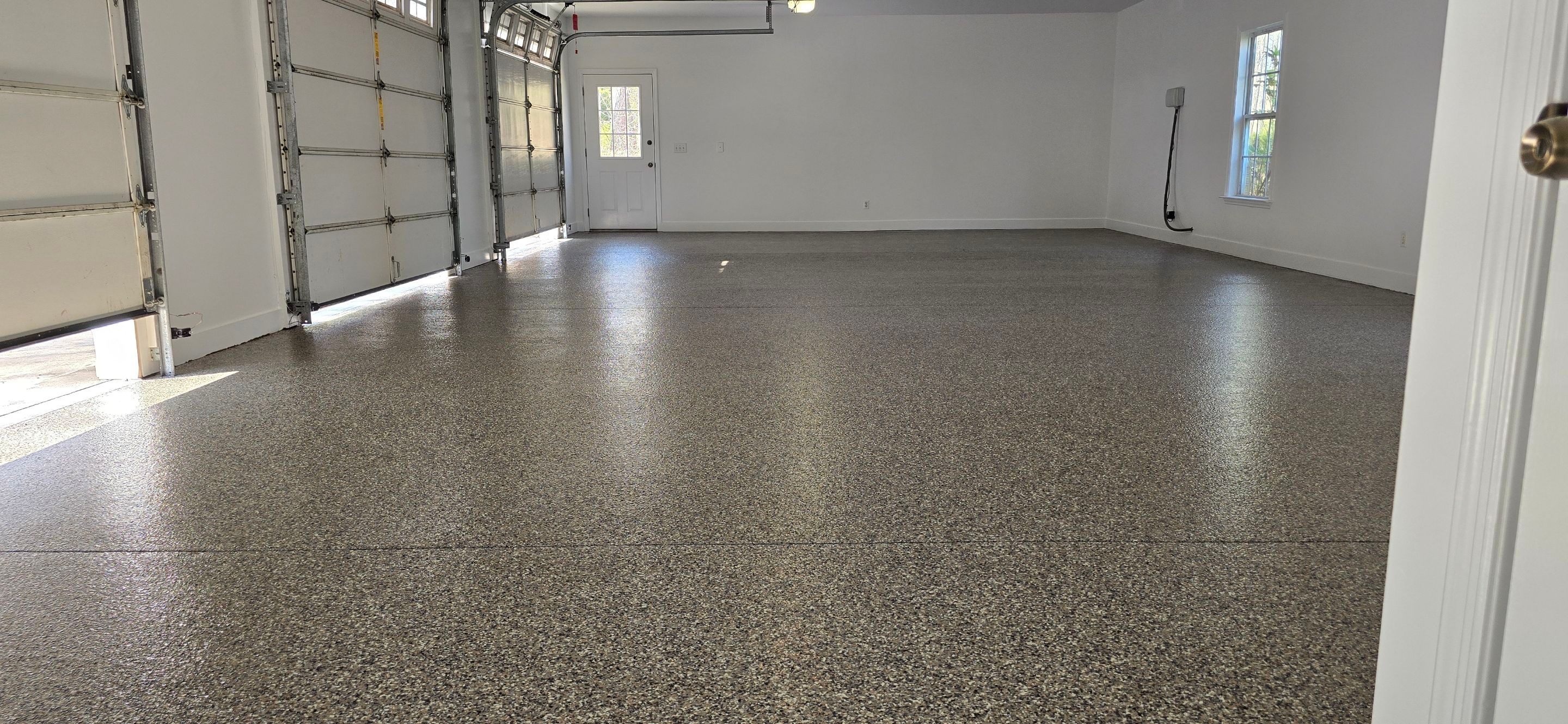 Garage Upgrade Using Custom Creekbed Blend by Elite Floor Solutions