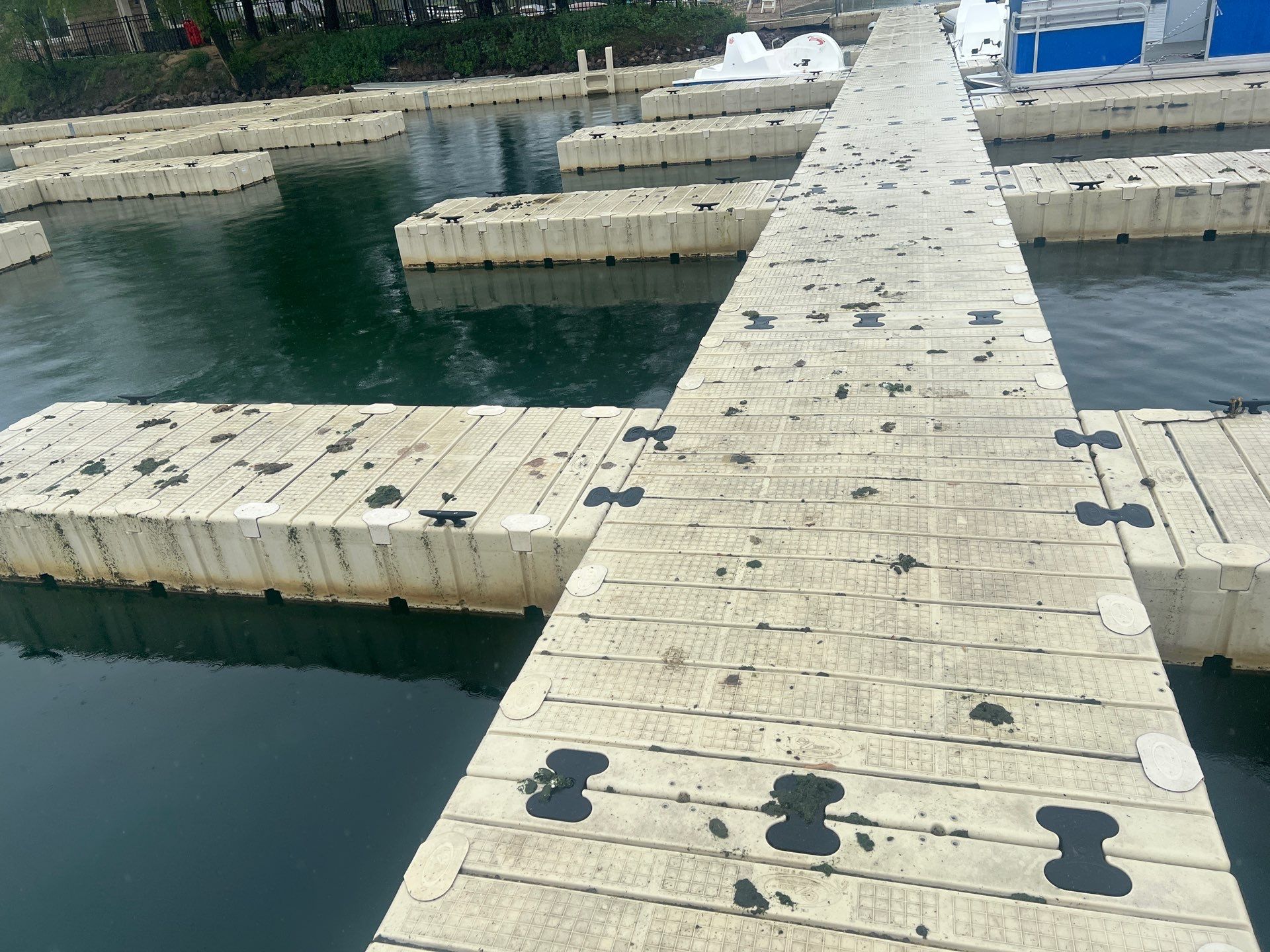 Power washing of floating dock by Northern Power Washing LLC.