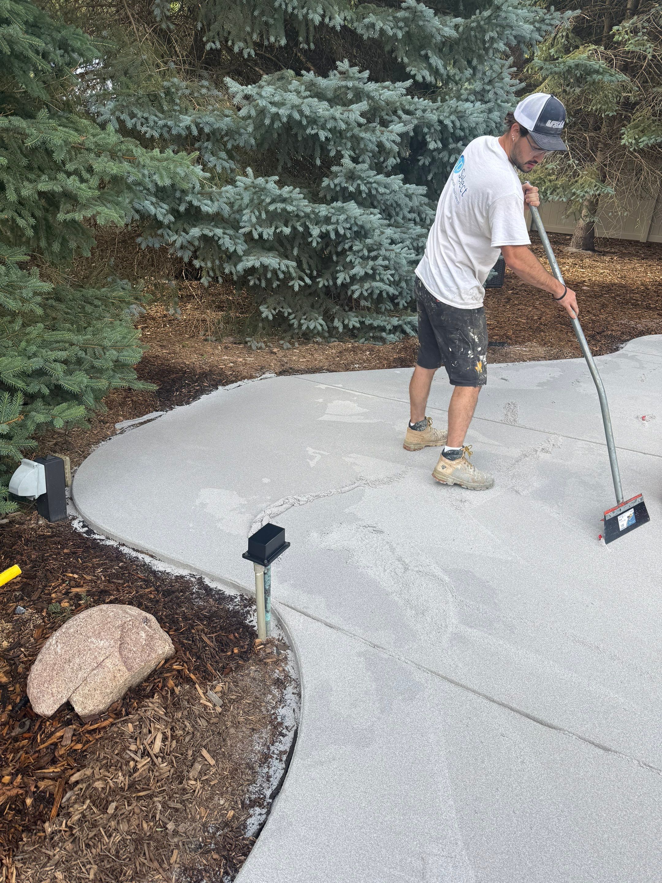 Decorative Concrete Pool Deck and Patio Resurfacing in Sioux Falls by Select Painting, Coatings & Garage Cabinets
