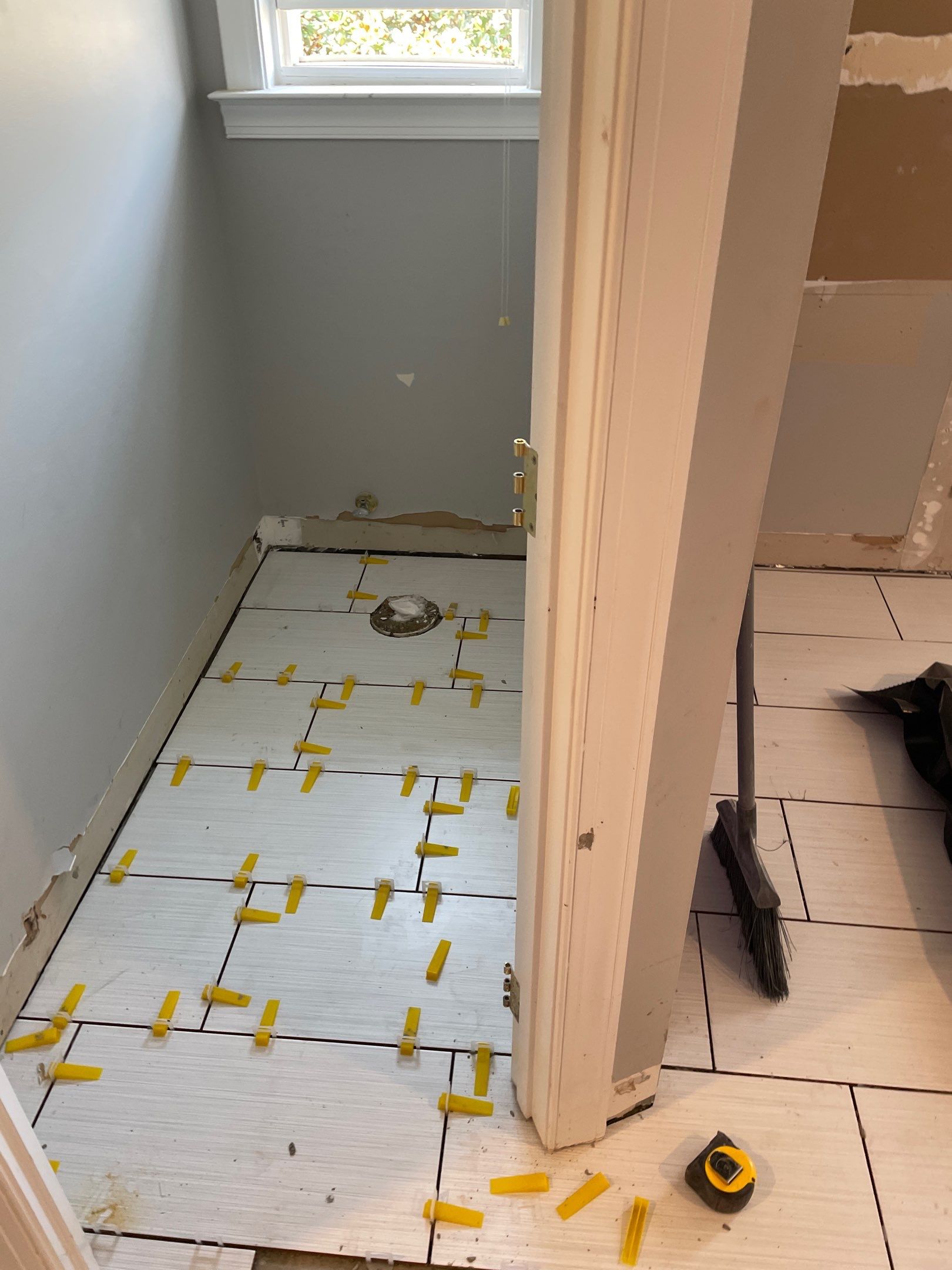 Bathroom Remodel using Schluter by Footprints Floors of Coastal Carolina