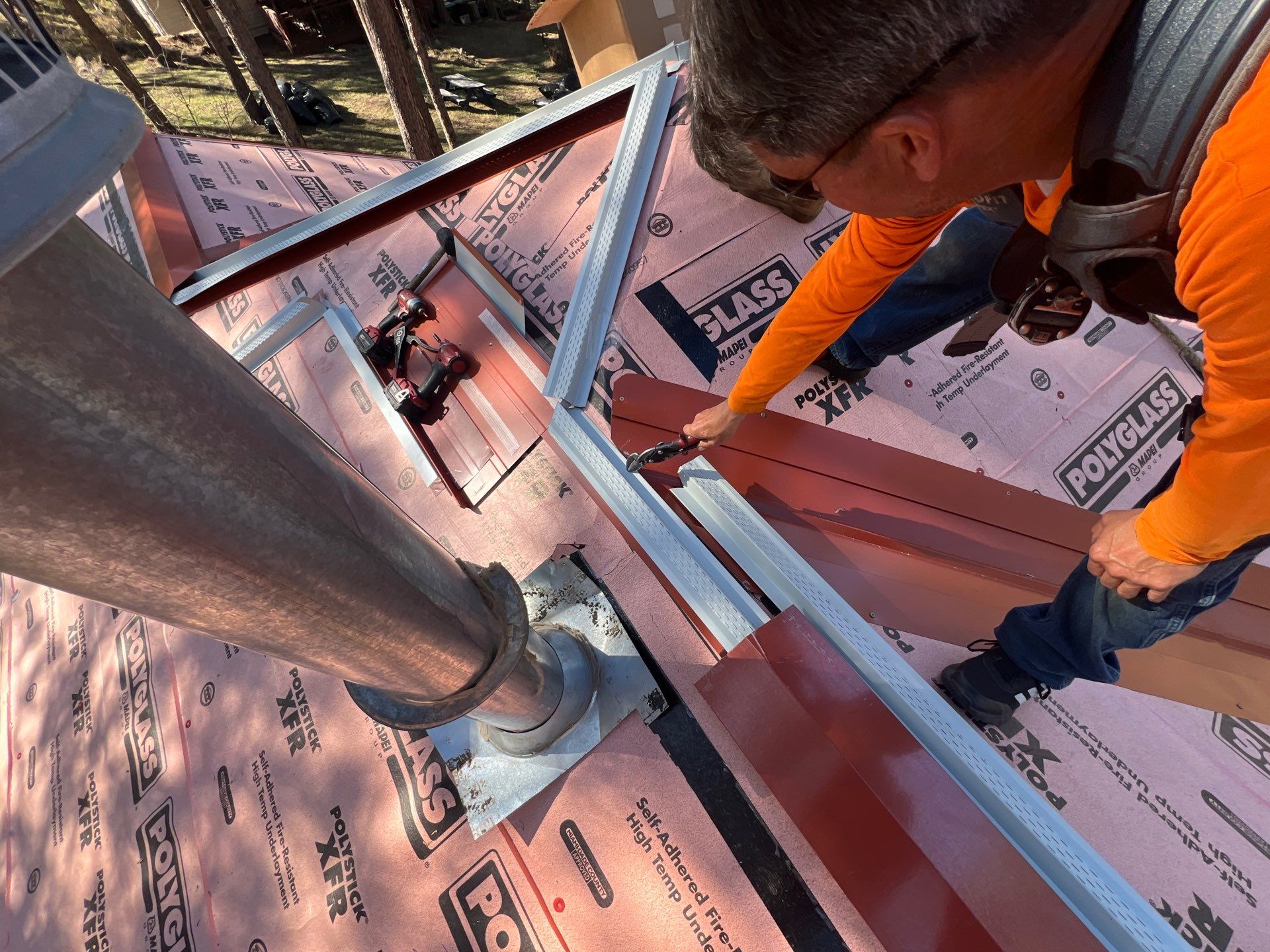 Residential Roofing Installation using Standing Seam Metal by Blue Peaks Roofing LLC 
