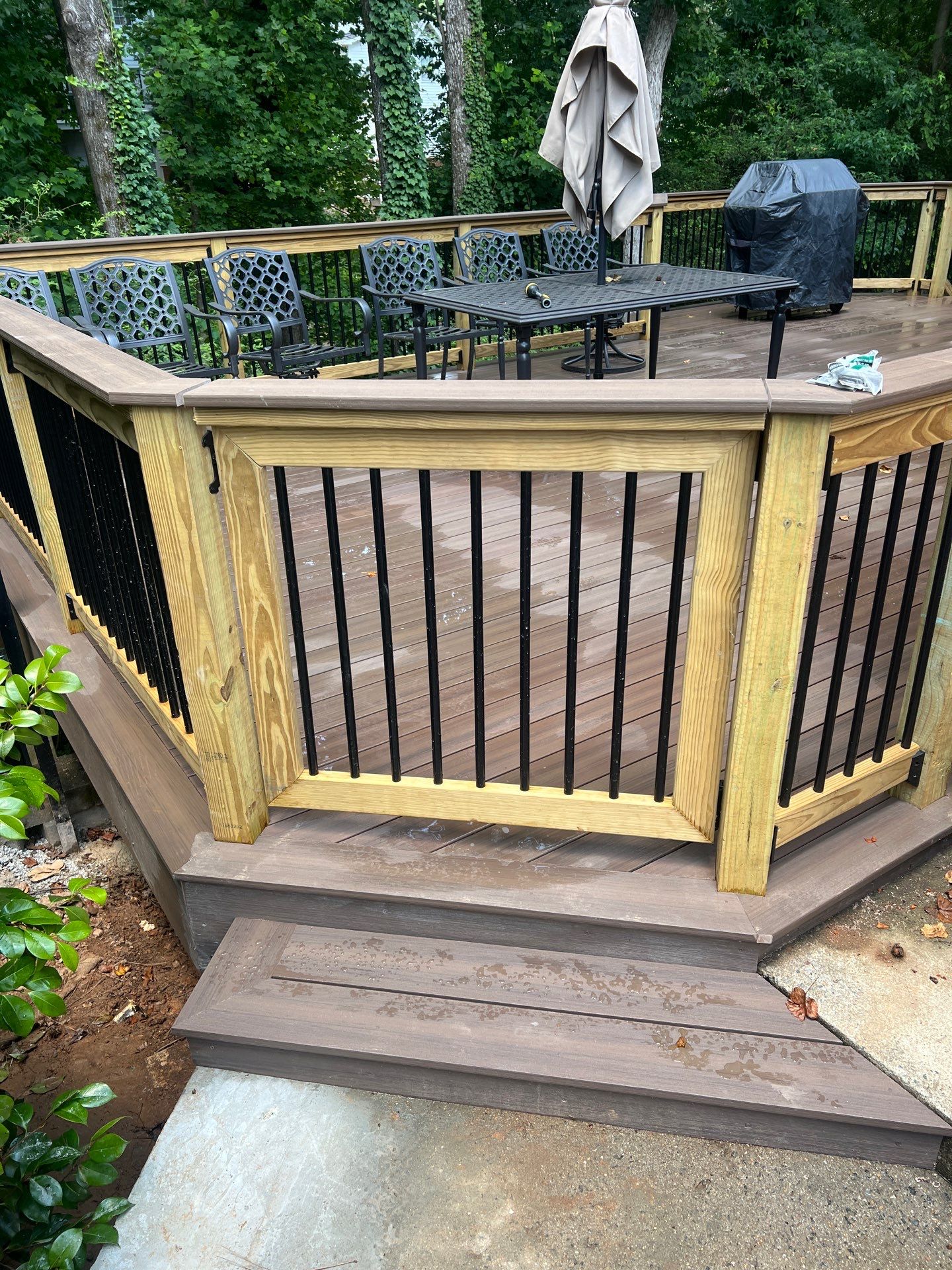 Deckorators Voyage Deck and Shed Style Covered Porch Build with Drink Rail by Nelson Exteriors 