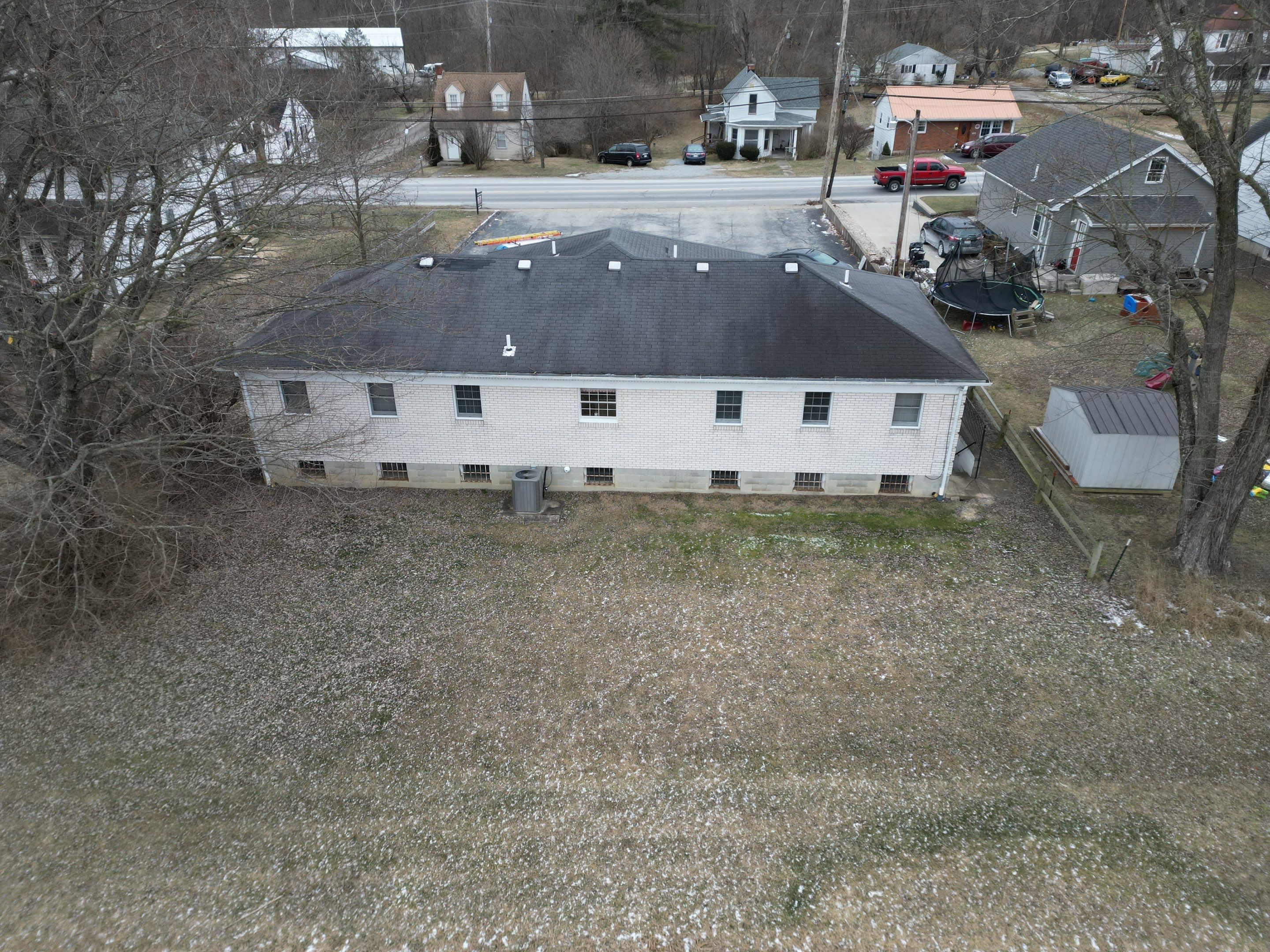 Commercial Roofing Installation using Performance Panel Metal - Frost Black by RoofX 