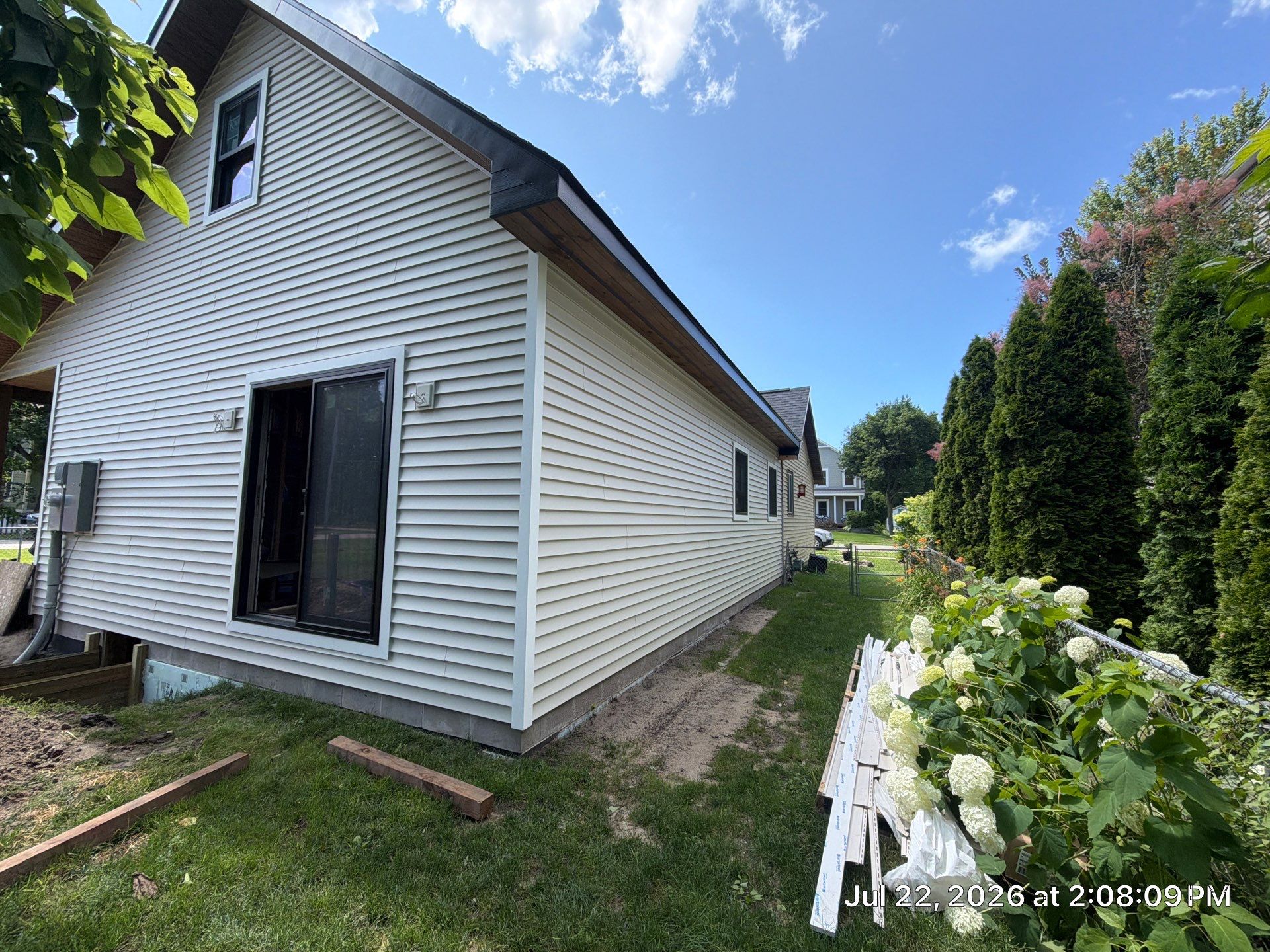 Residential Gutter and Downspout Installation in Elk Rapids by Rainbow Seamless Systems