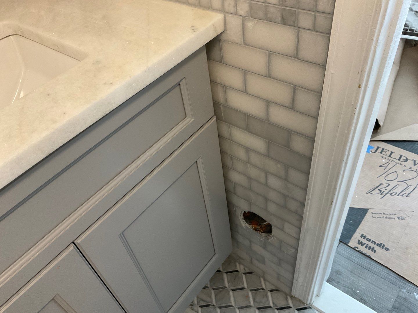 Bathroom Remodel using Two new bathroom design and new floors by Alpha Design Services