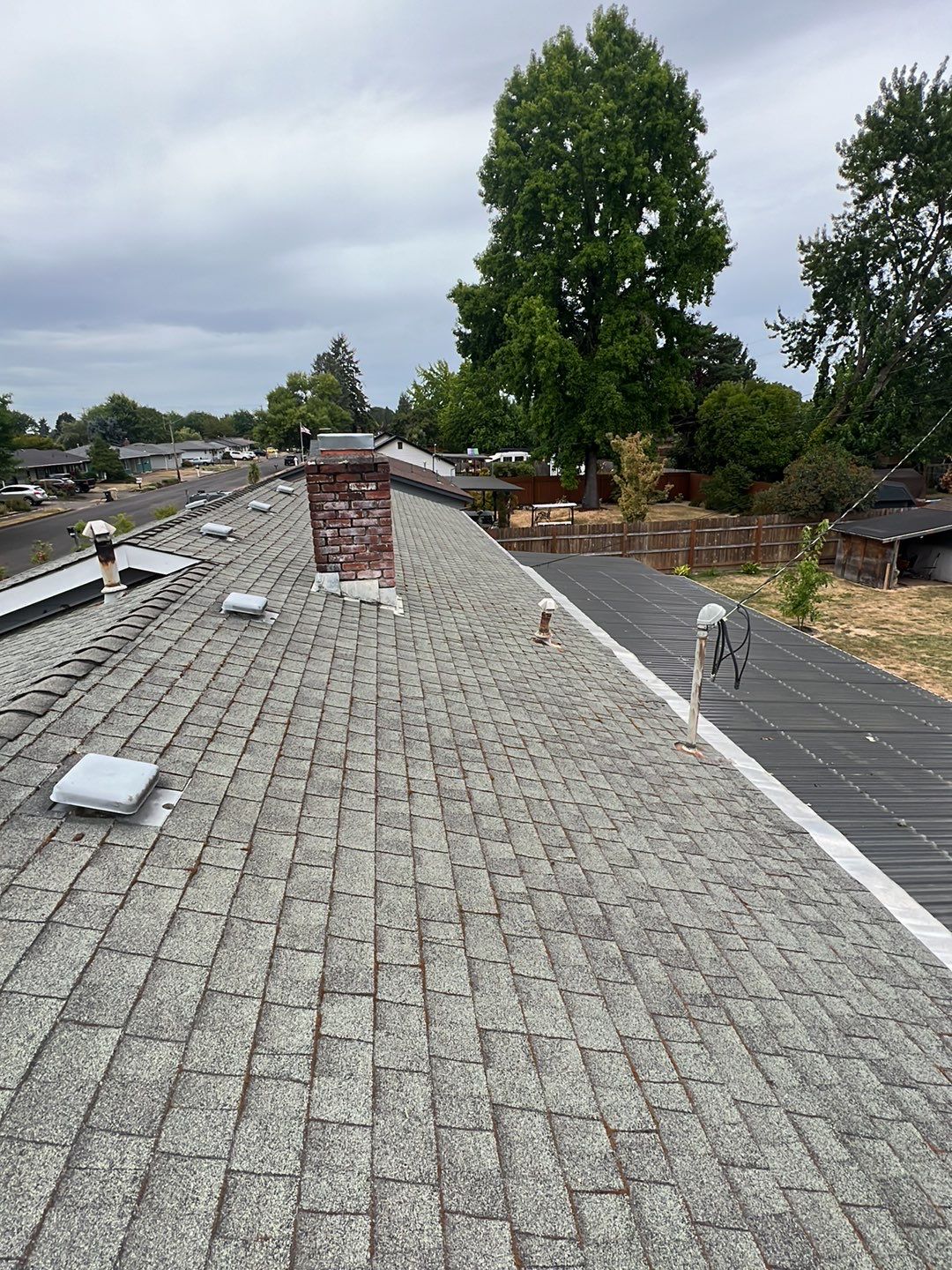 Residential Roofing Installation using IKO Dynasty (Color: Frostone Grey) by Orezona Building & Roofing Company, Inc.