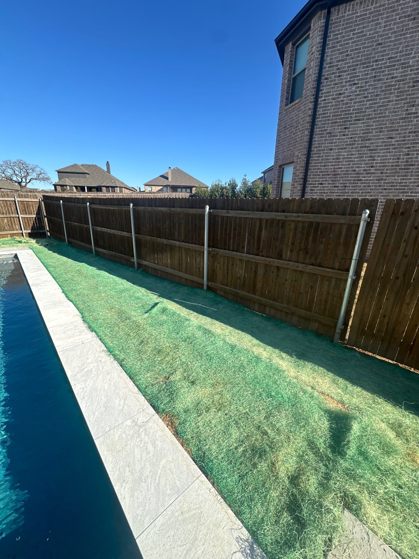 Modern Lap Pool with Turf Surround by Pinnacle Pools and Spas - DFW