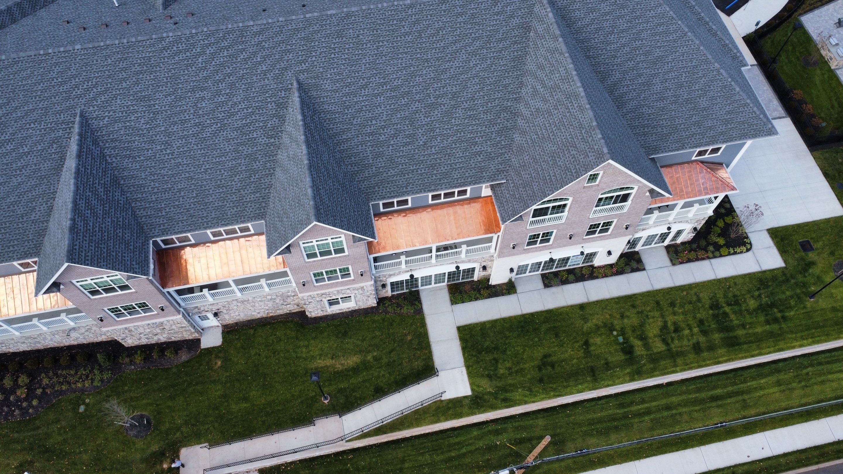 Standing Seam Metal Roof using Copper by CMNG LLC