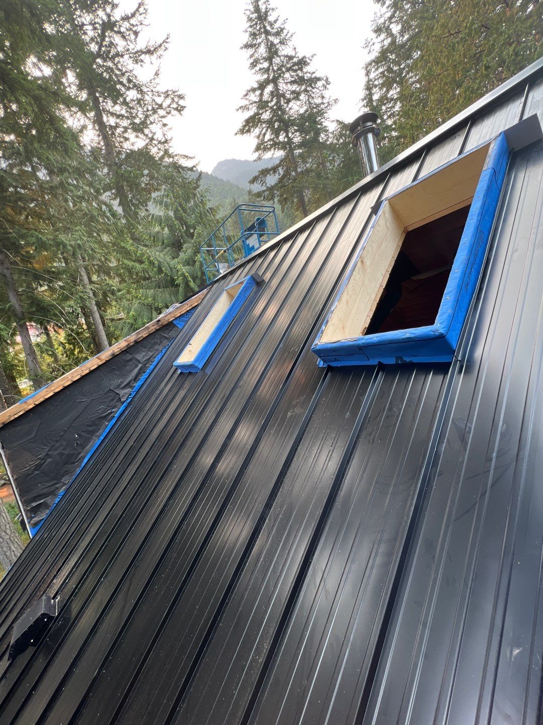 Residential ReRoofing Installation using 12" Prolok metal  by Top Notch Roofing Inc