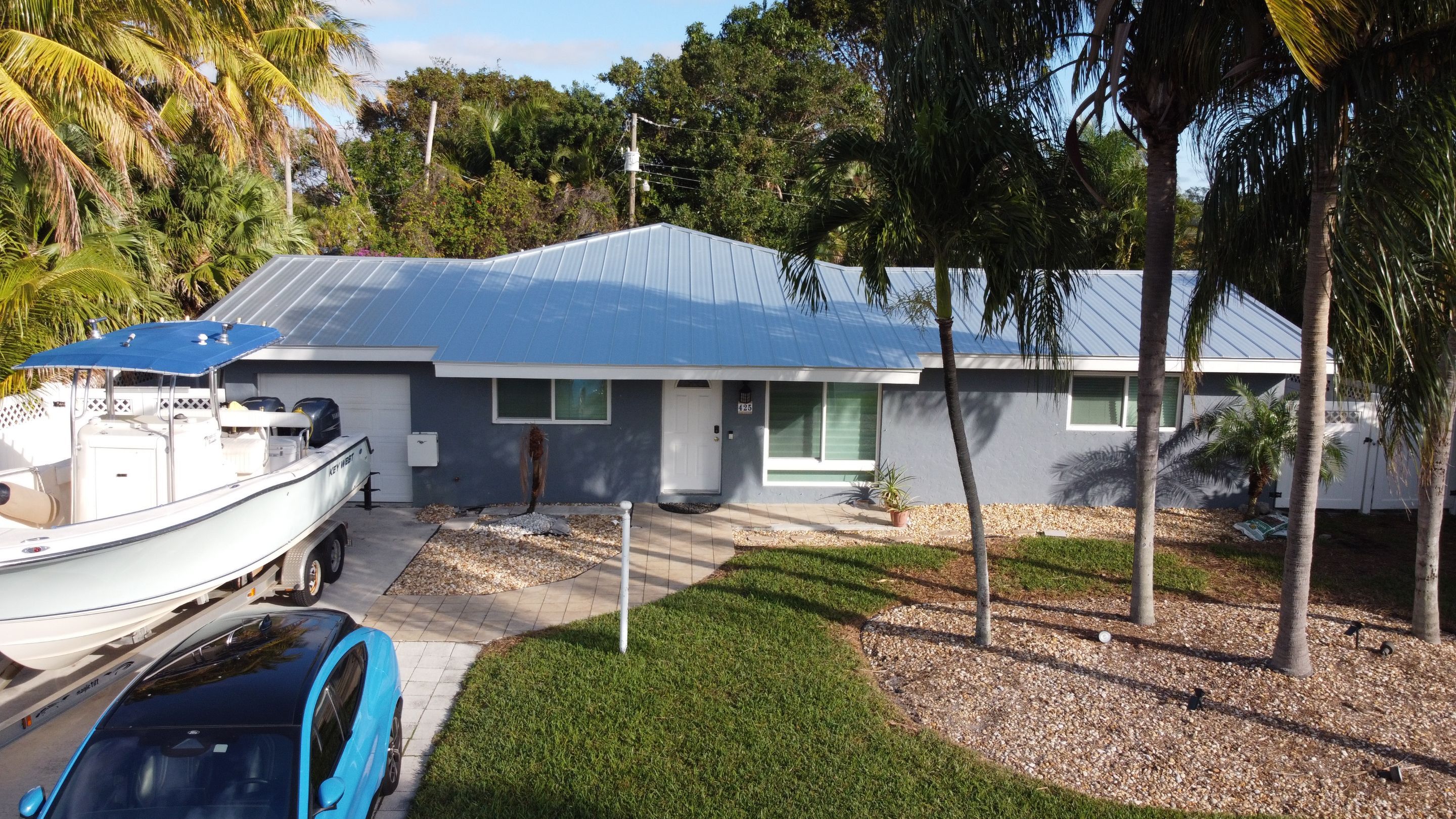 Residential Roofing Installation using 1" Nail strip metal roof by BLUES BROTHERS CONSTRUCTION CORP