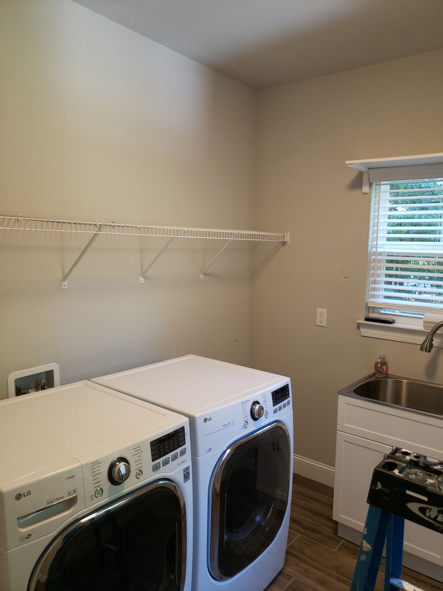 Laundry Room Storage Transformed! by A Step Above Handy LLC