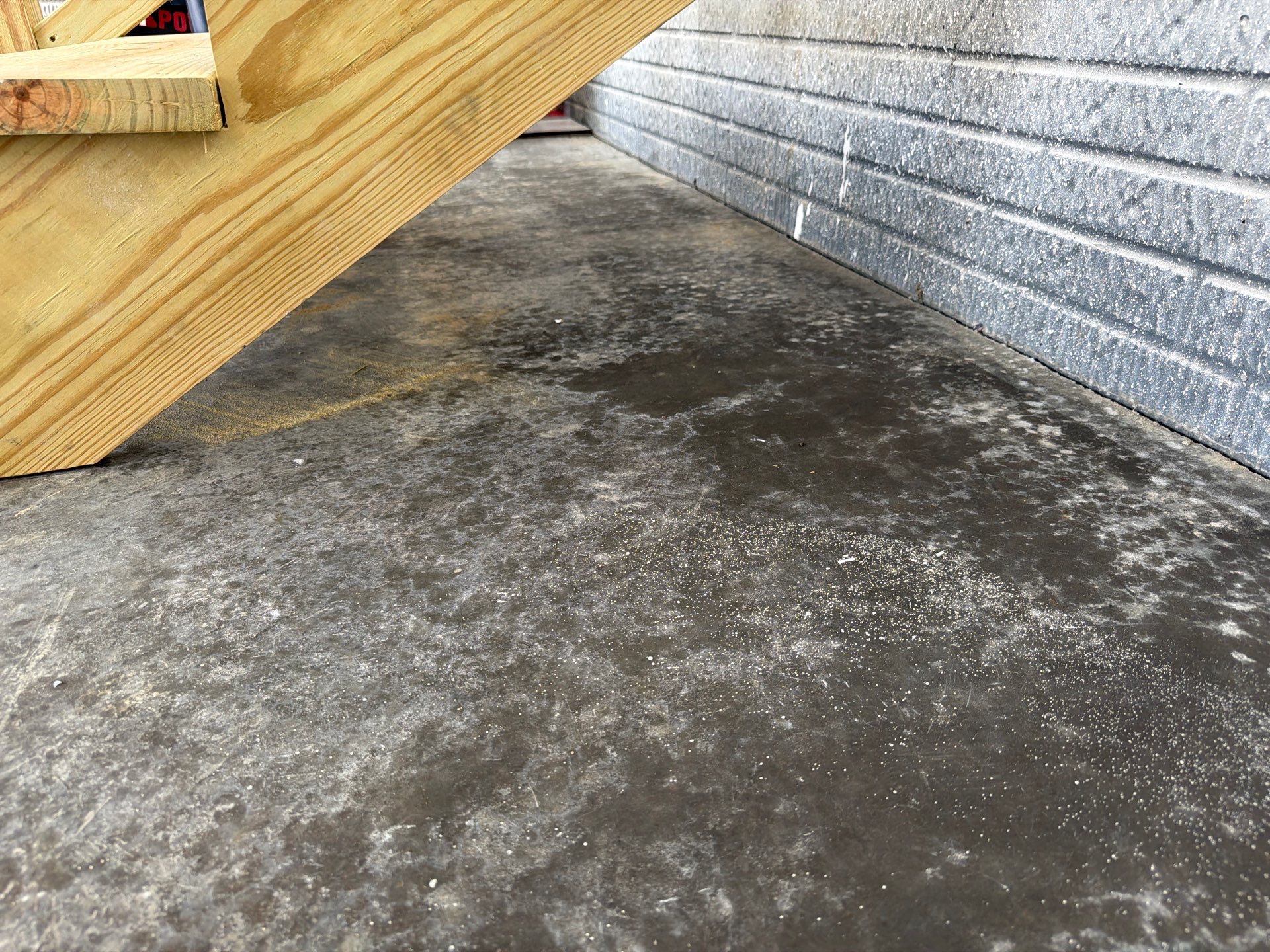 Cabin Fever Decorative Flake Garage Floor Coating in Sioux Falls by Select Painting, Coatings & Garage Cabinets