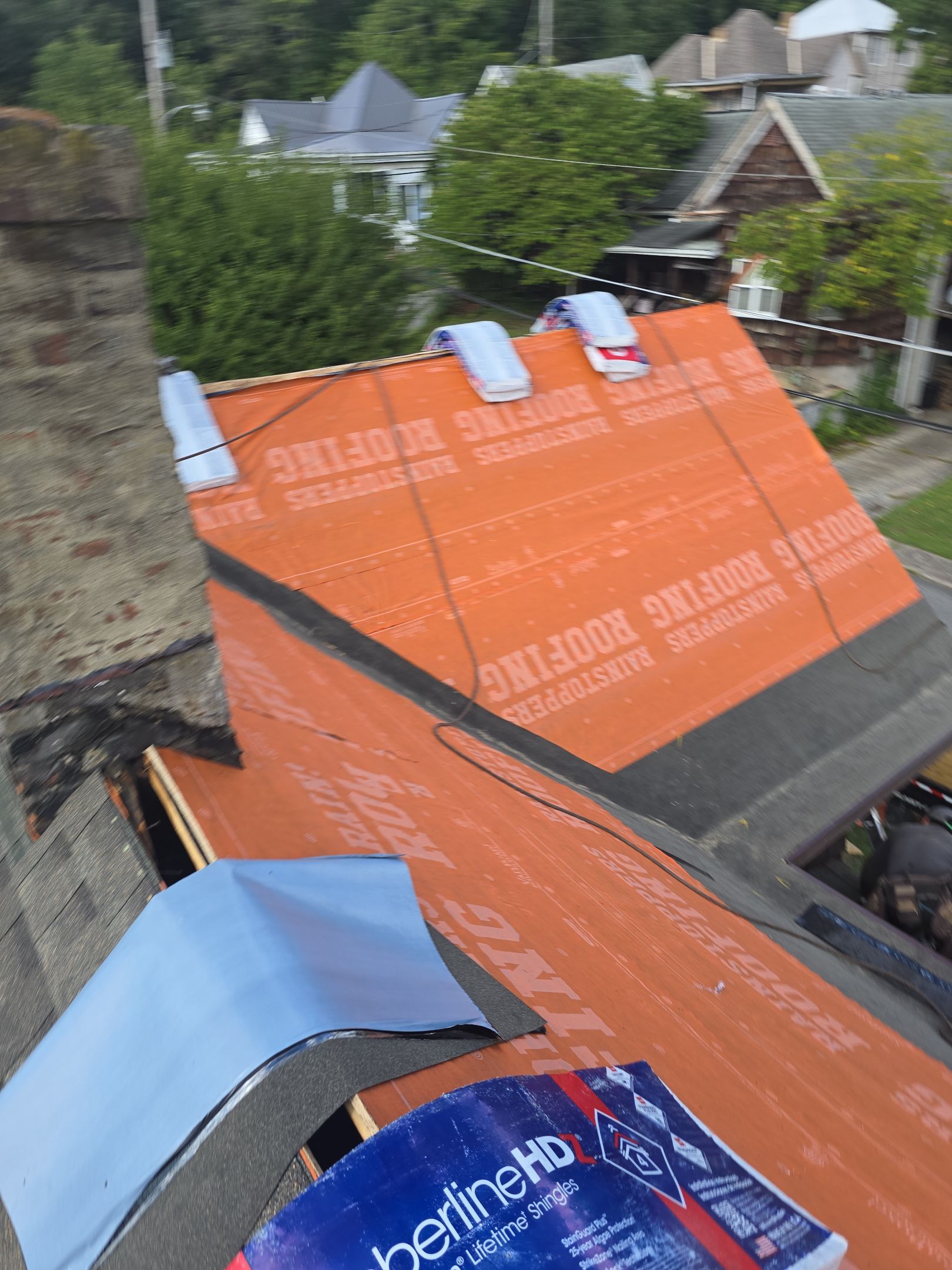 Residential Roofing Installation using GAF Timberline HDZ Weathered Wood by Rainstoppers Roofing