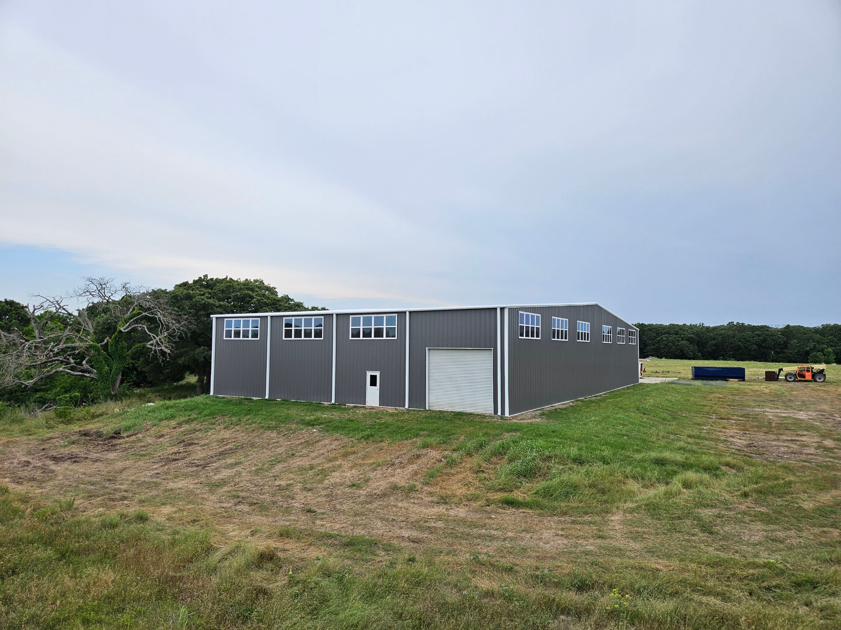Complete Restoration with Skylight/Window Install - Greenville, TX by Hostetler Roofing