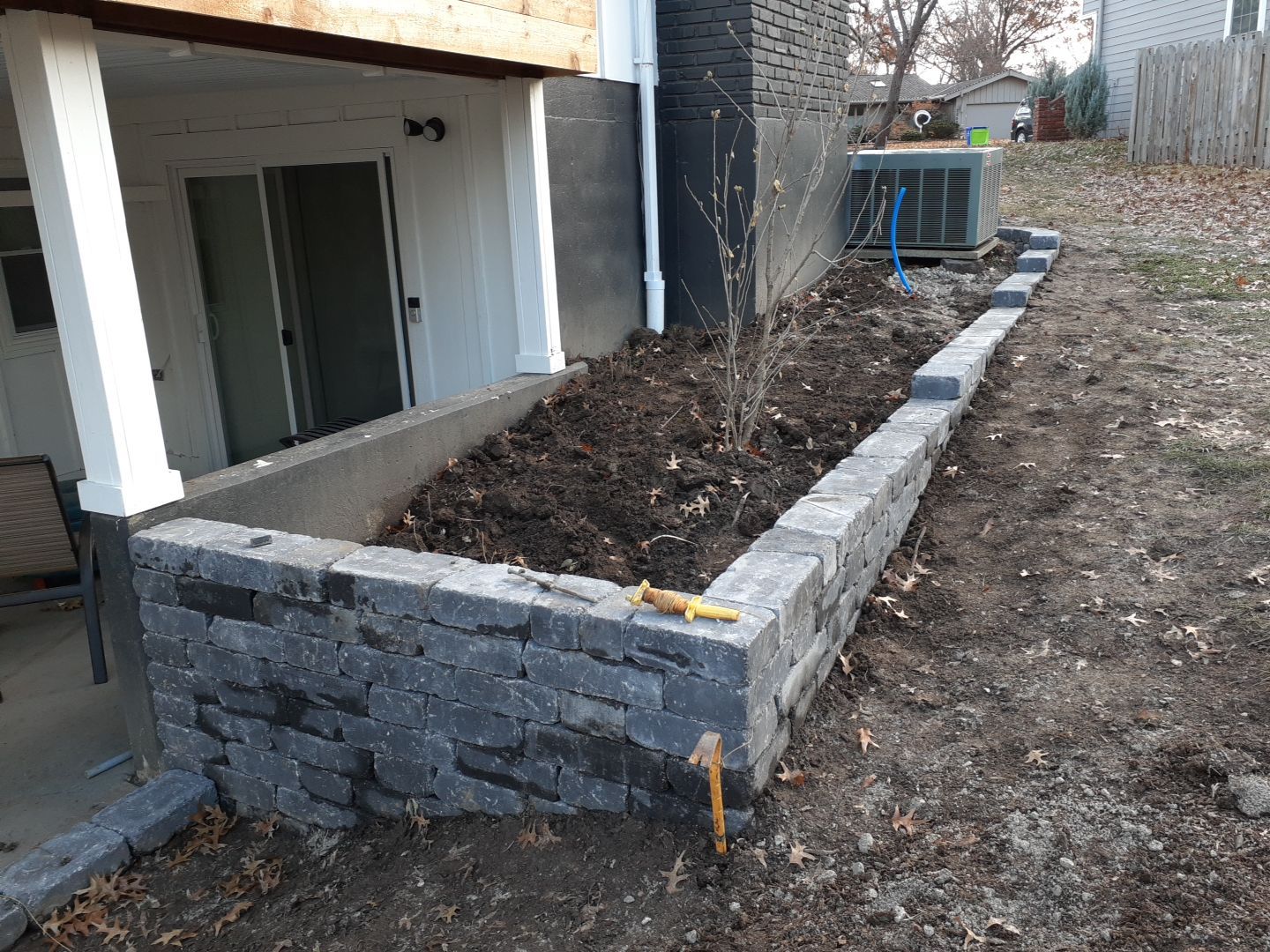 Entire Home Landscape and Retaining Walls by LAND ESCAPES LLC