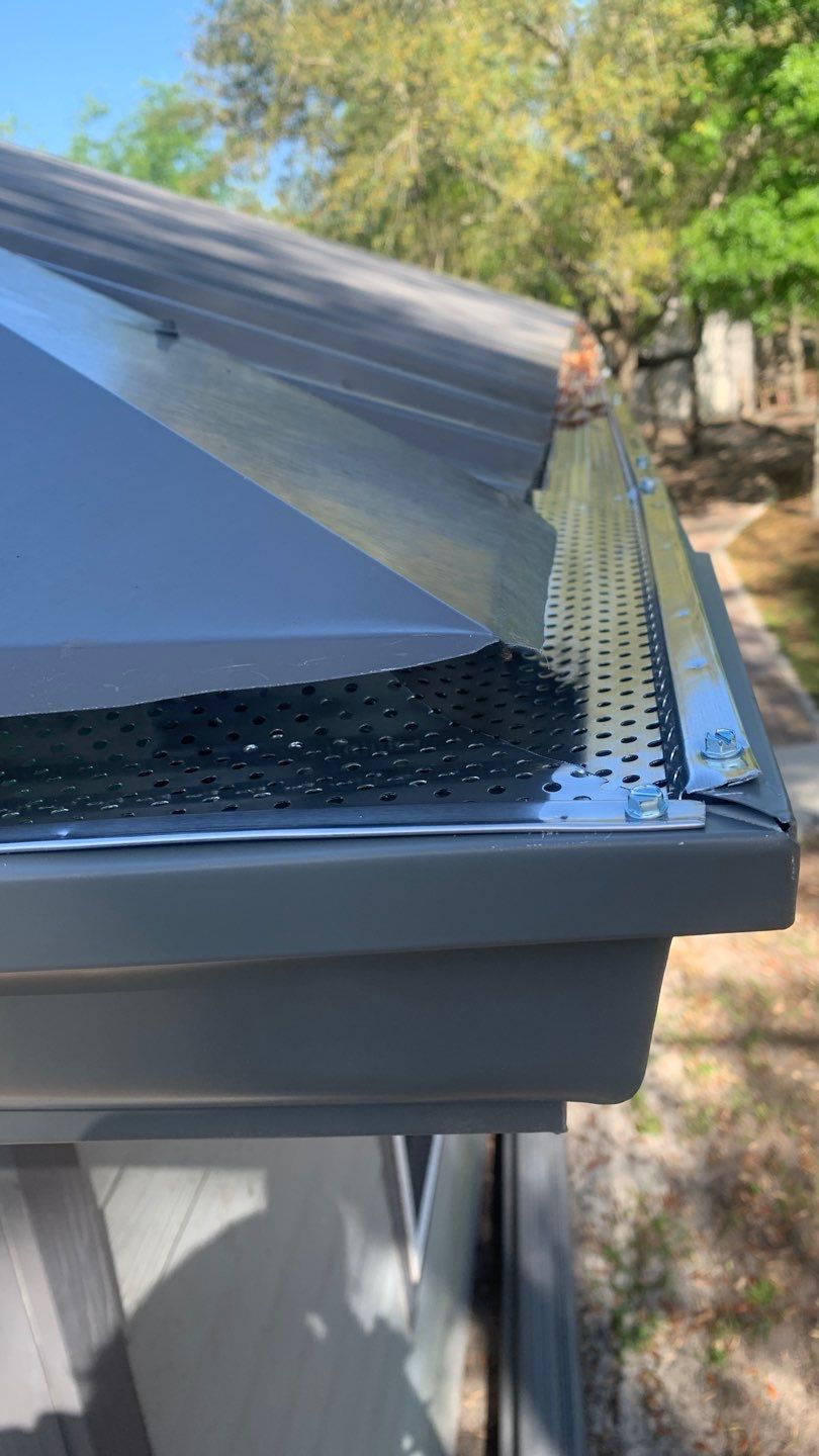 Gutter Installation Using Charcoal Grey K-Style Seamless Aluminum Gutters by Gutter Professors