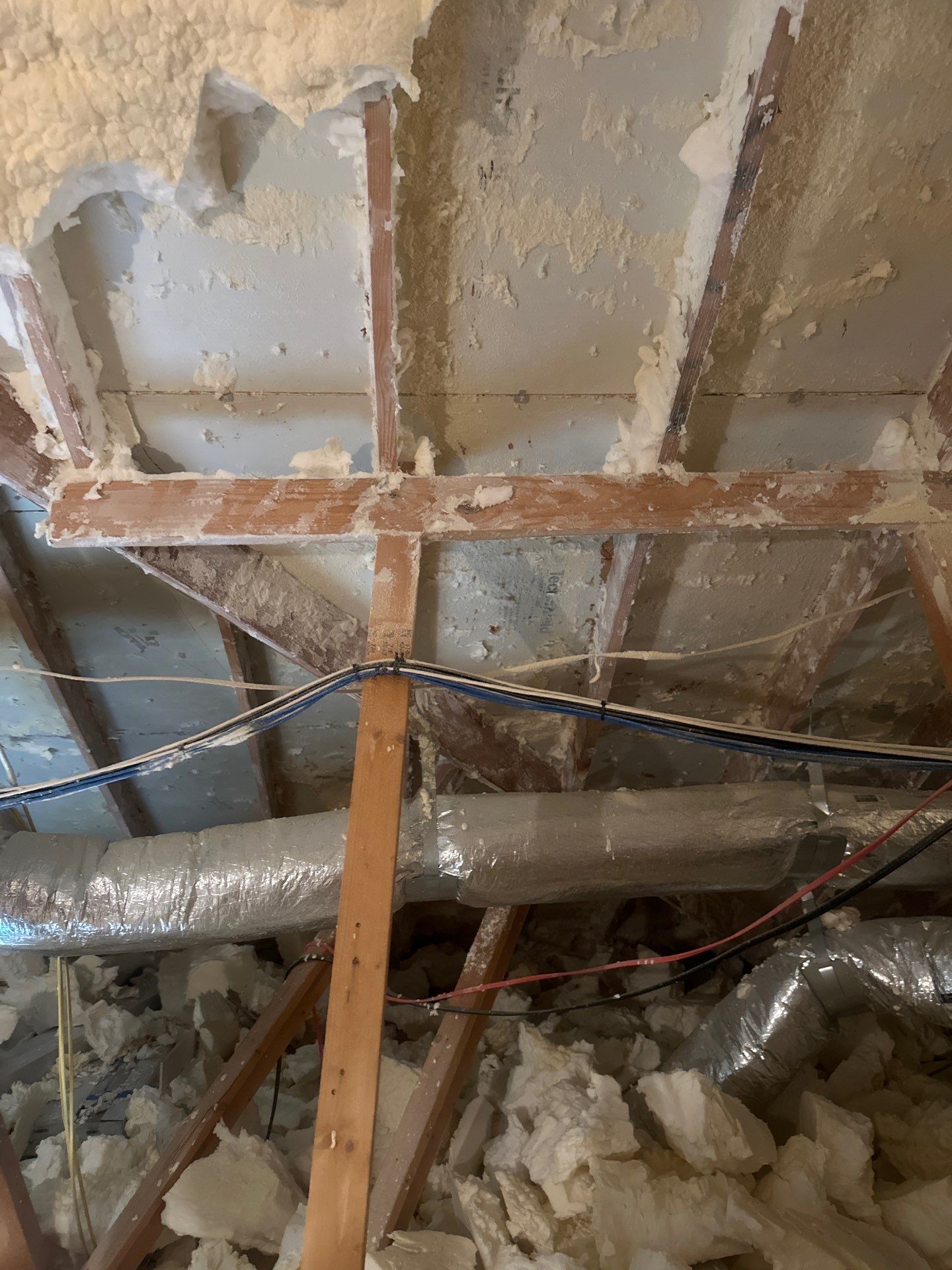 Spray foam insulation removal & re spray by Apex Insulation Solutions