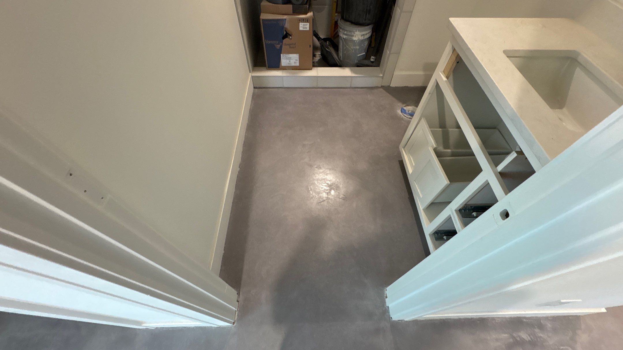 Basement Floor Overlay - Lawrence, KS by Big Red Decorative Concrete, LLC