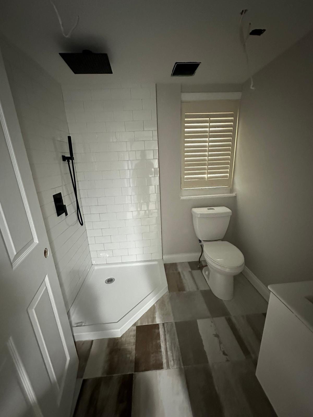 Bathroom Remodel using Cabinets by Home Concepts Construction