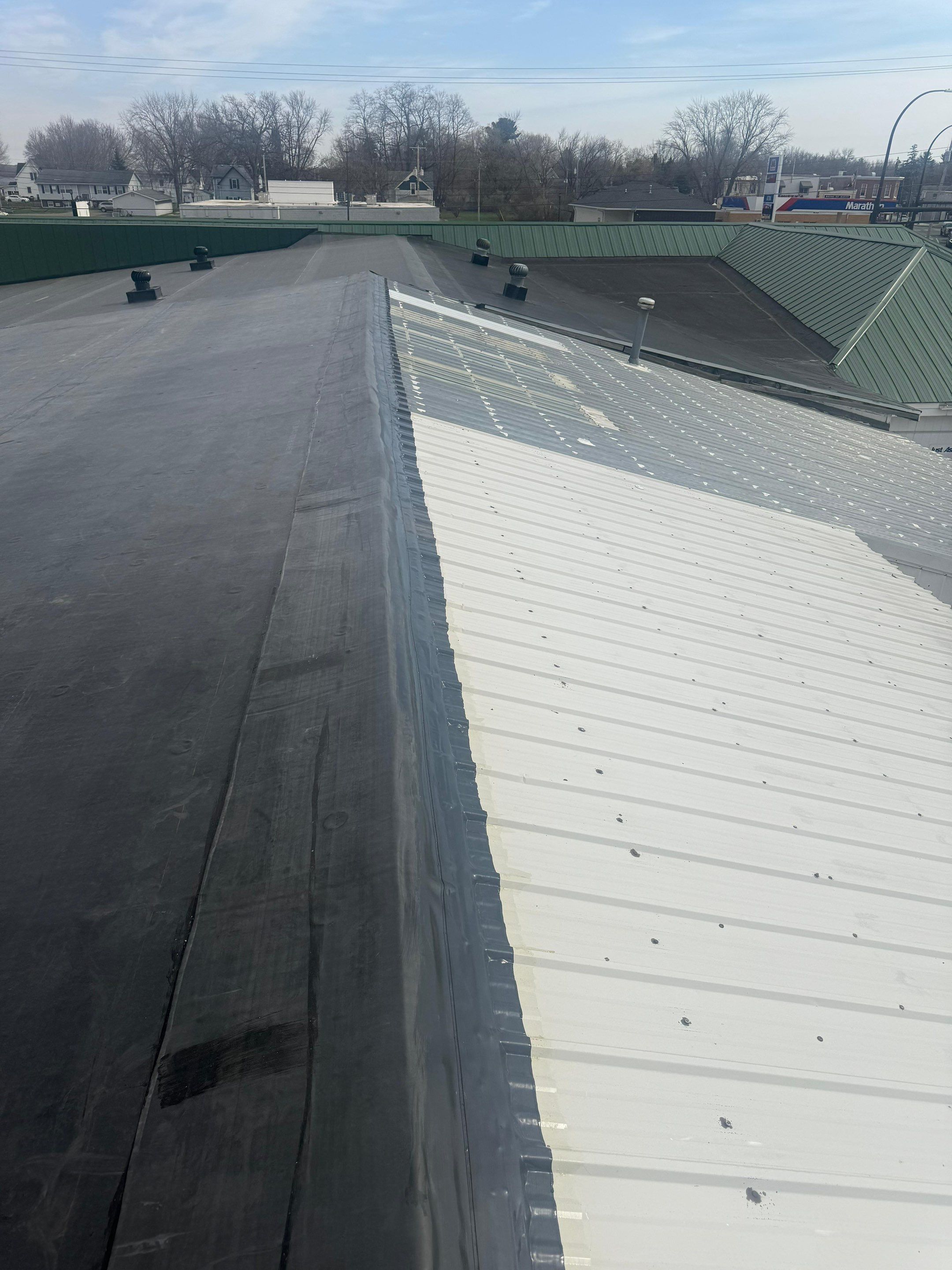Flat Roof   by Gunner Insulation and General Contracting