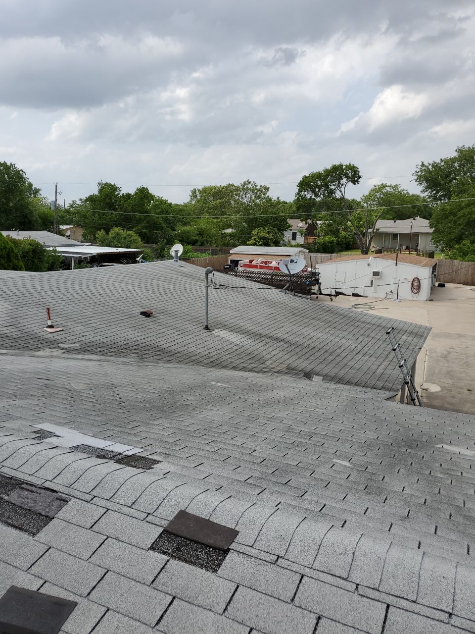 Residential Roofing Installation using Roofing Shingles by Harvey Roofing & Construction