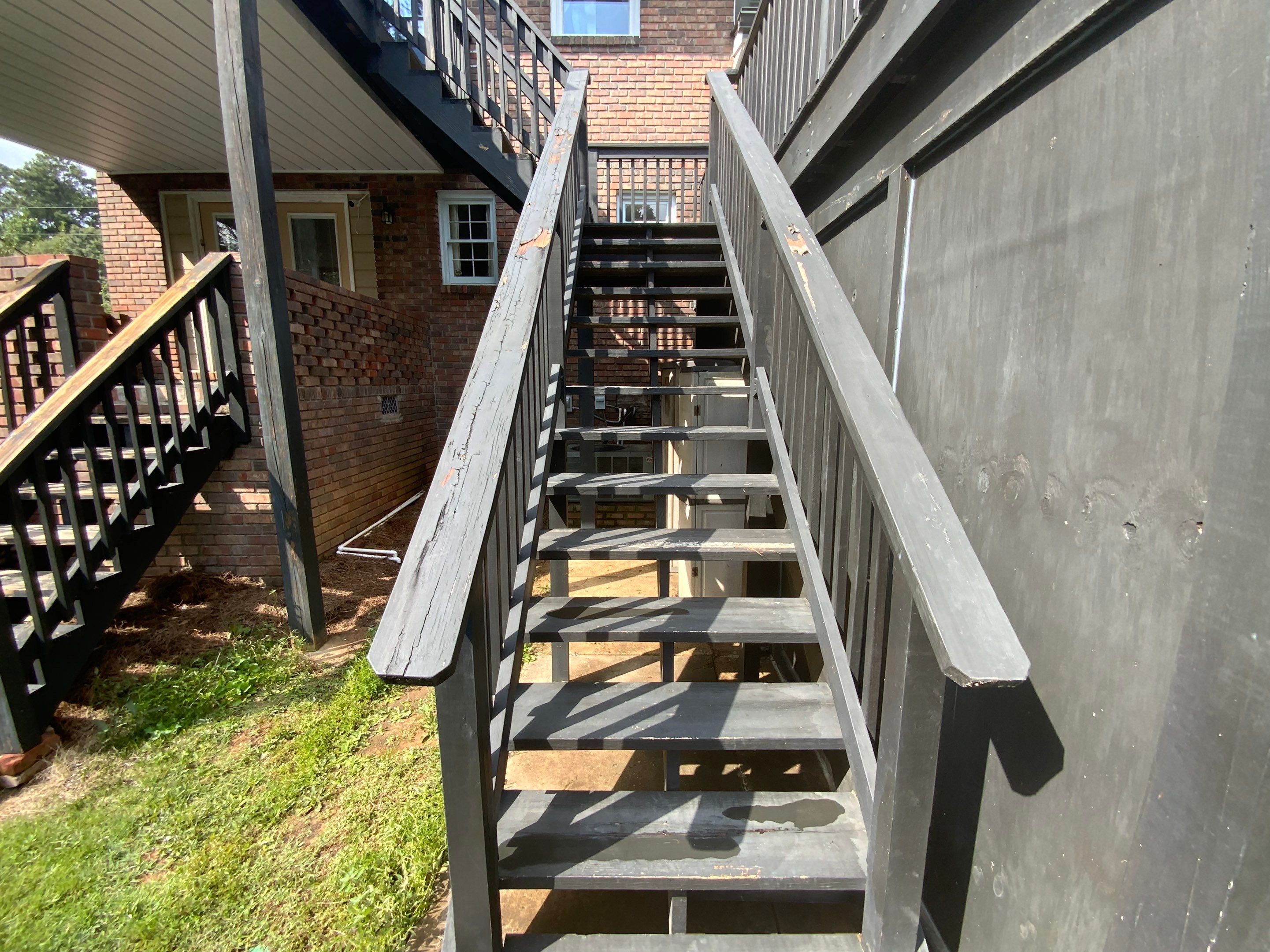 Full Exterior Trim Painting and Multi-Level Deck Staining by Swift Home Renovations