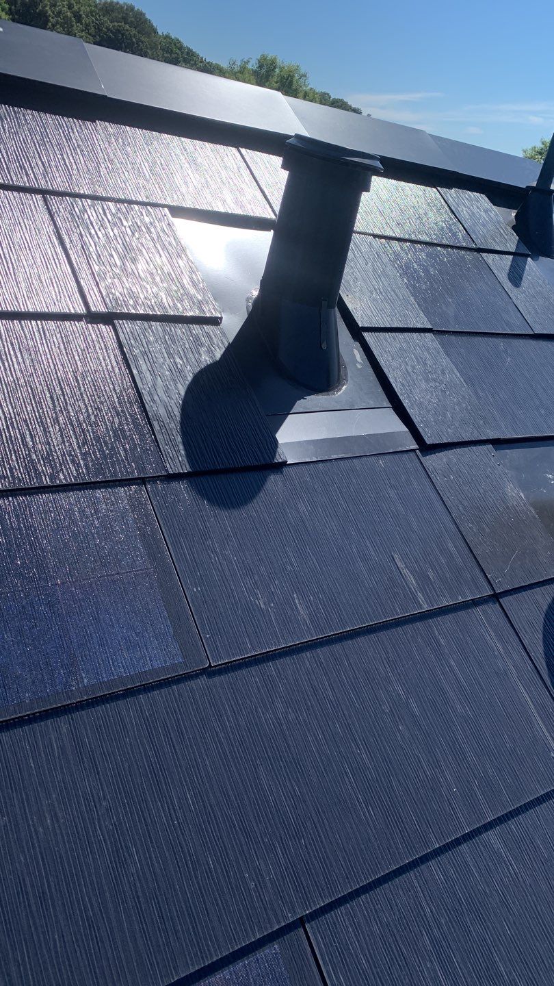 Tesla Solar Roof Replacement using Tesla Solar Roof V3 tiles by American Home Contractors