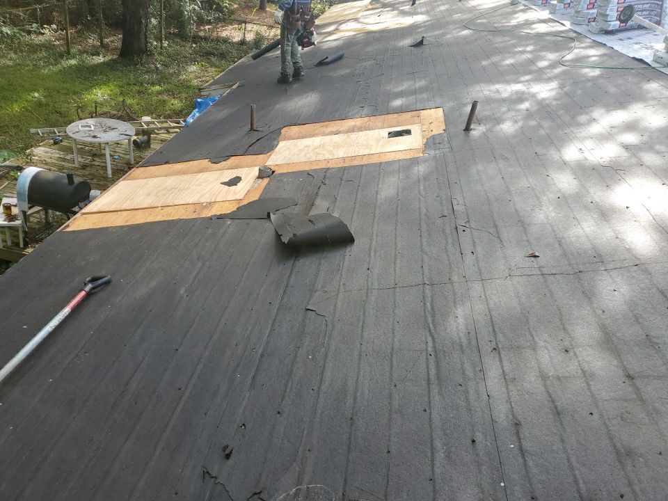 Residential Roofing Repair using Roof Replacement by American Roofing & Construction LLC