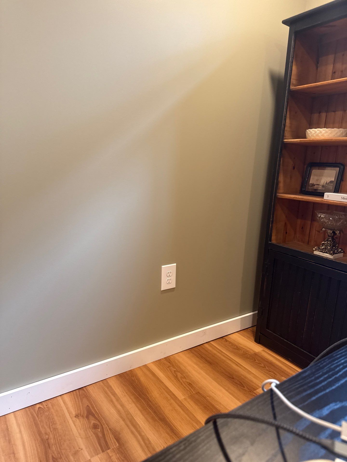Lincoln Interior Renovation Featuring Sage Green Walls and Laminate Flooring by CompanyCam Sales Demo