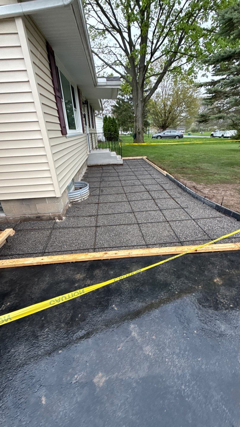 Oxford slate textured patio and step  by NG Masonry & Construction LLC
