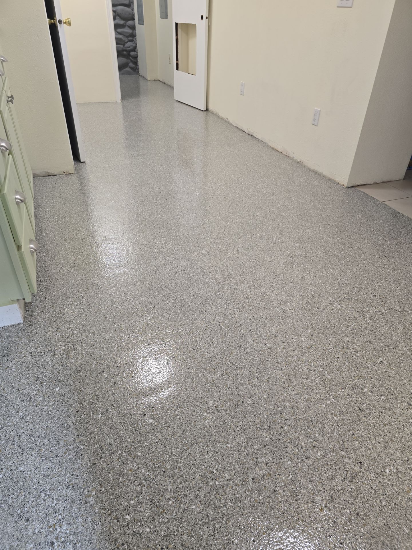 Quartzite Hybrid Flooring Transformation for a Kennewick Utility Room by Croc Coatings, LLC