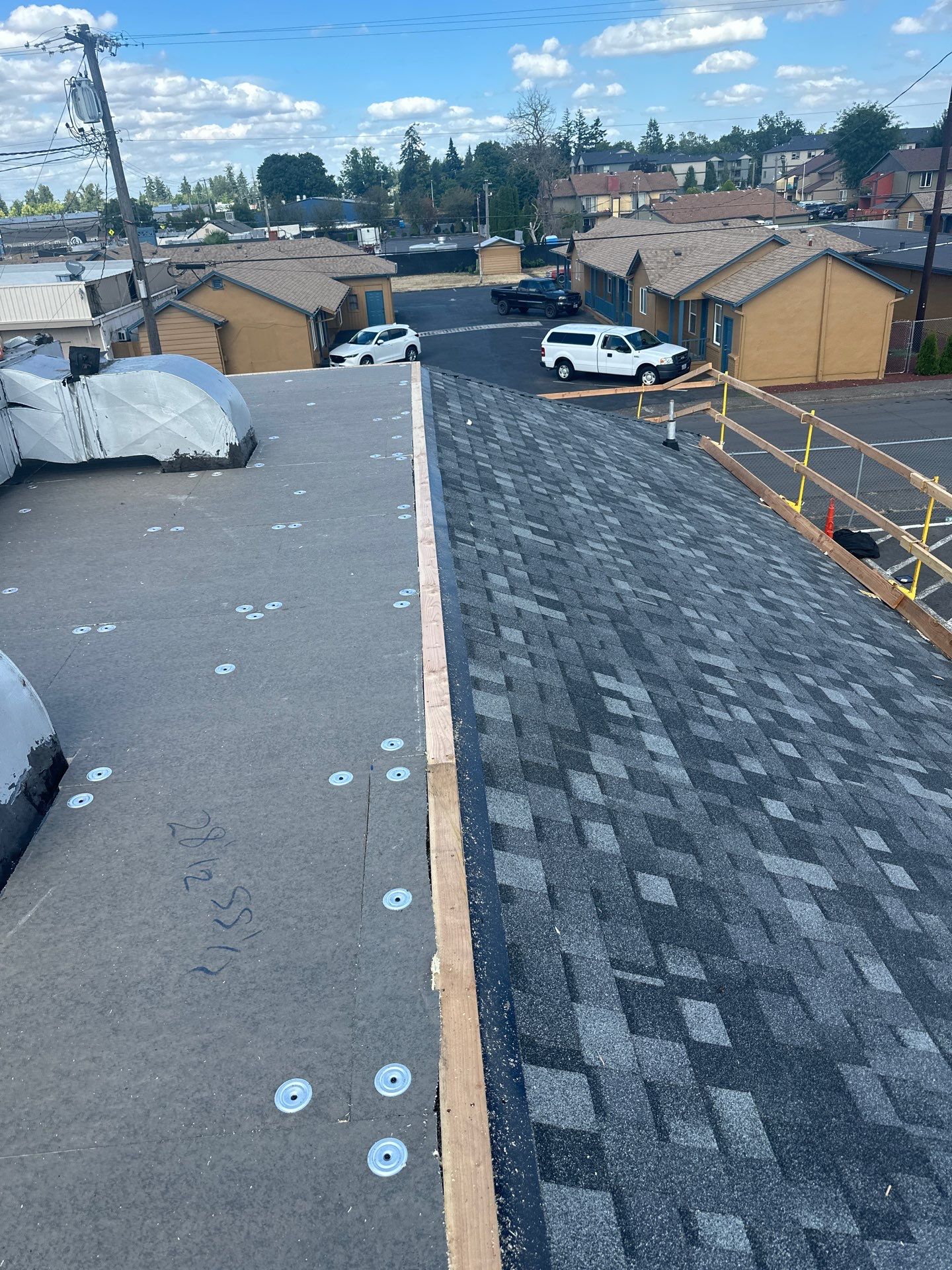 Summit Grey Lum Yun Salem Oregon Commercial Roof by Orezona Building & Roofing Company, Inc.
