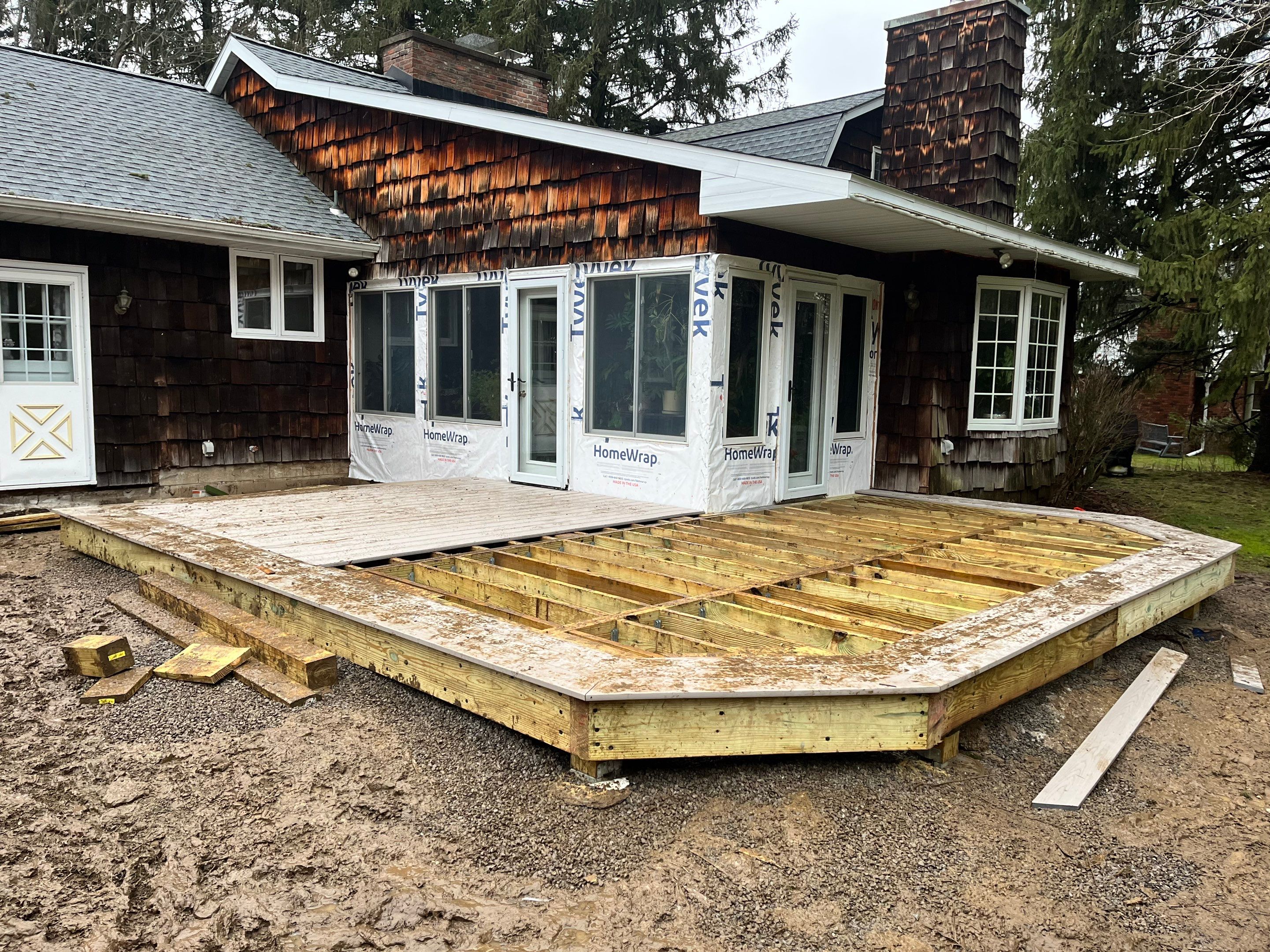 Deck and Stamped Concrete by Ivy Lea Construction