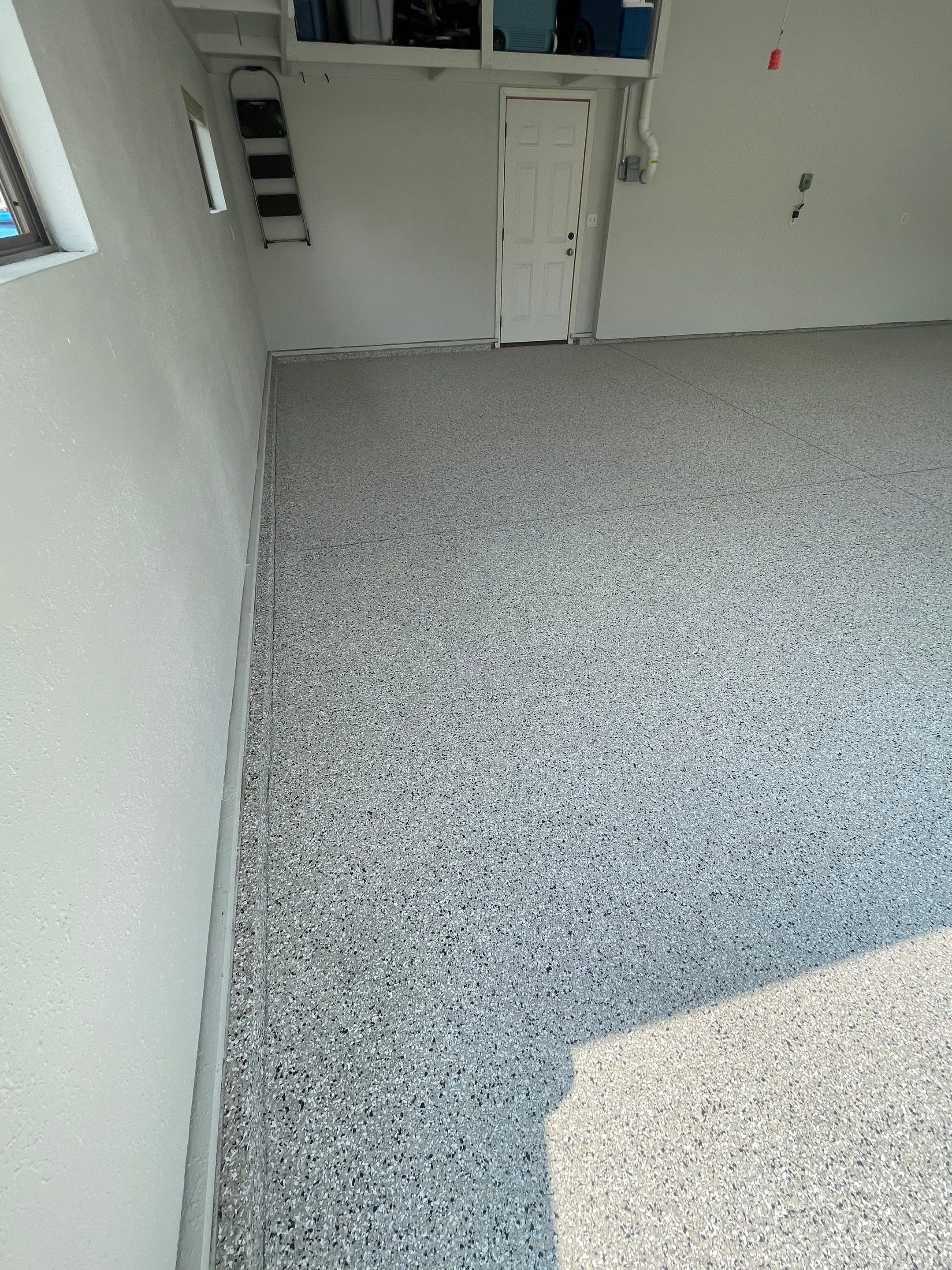 Multi-Car Garage Floor Coating and Crack Repair in Tea by Select Painting, Coatings & Garage Cabinets
