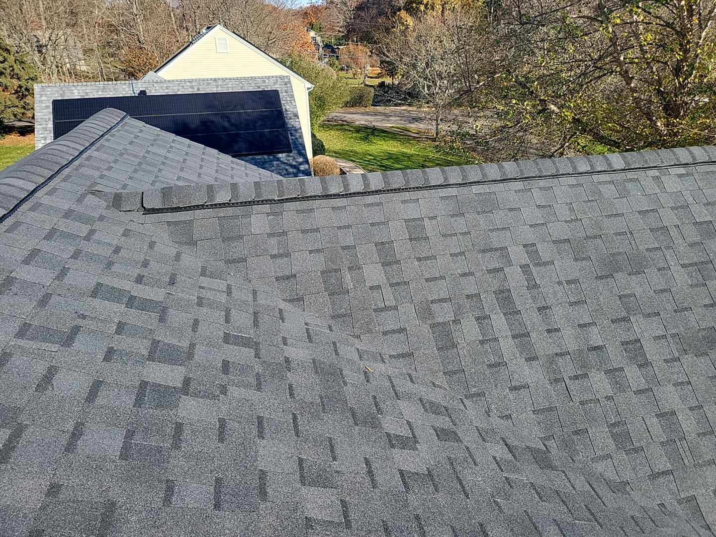 Residential Roofing Installation using Certainteed Landmark Moire Black by A Plus Exterior