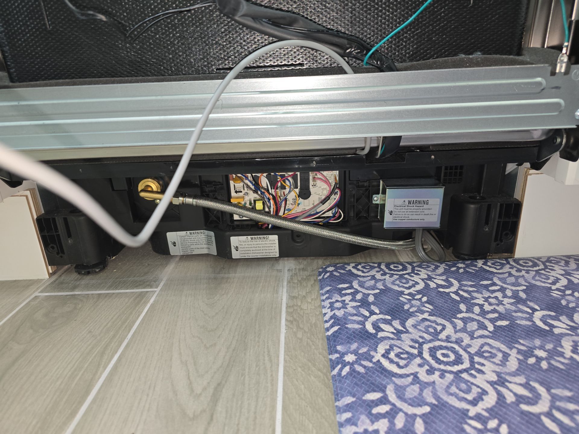Improper installation by AMB-WORKS APPLIANCE REPAIR