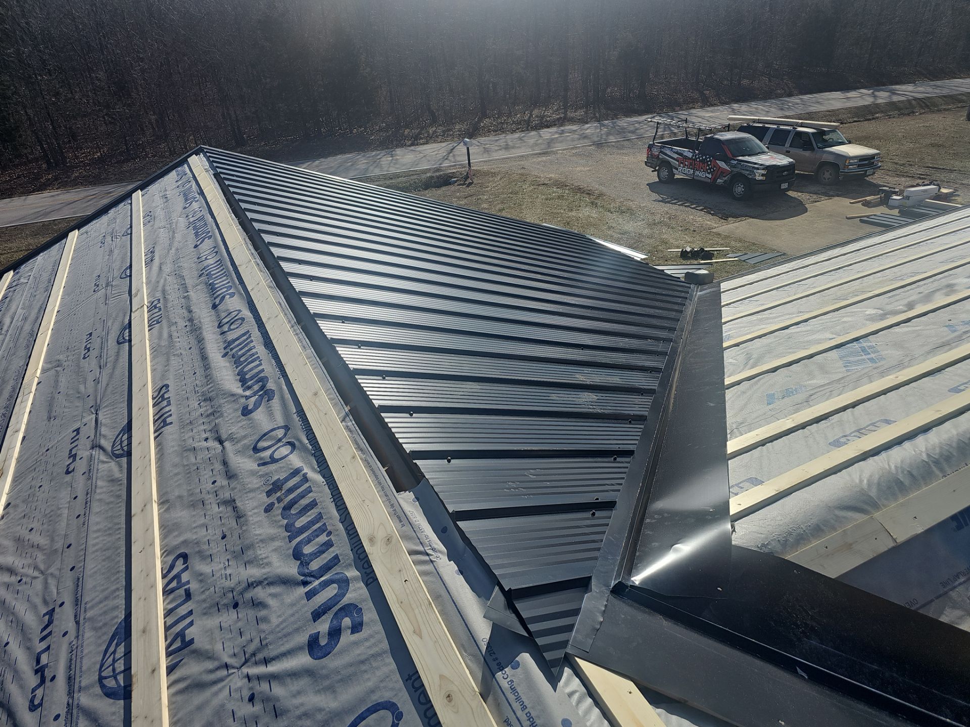 Residential 26 Gauge M-Rib Metal Roof + Gutters, Downspouts & Gutter Covers Install  by Titan Commercial & Residential Roofing 