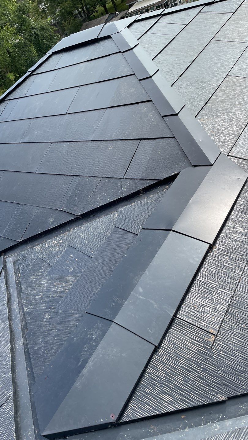 Tesla Solar Roof  using Tesla Solar Roof V3 tiles by American Home Contractors