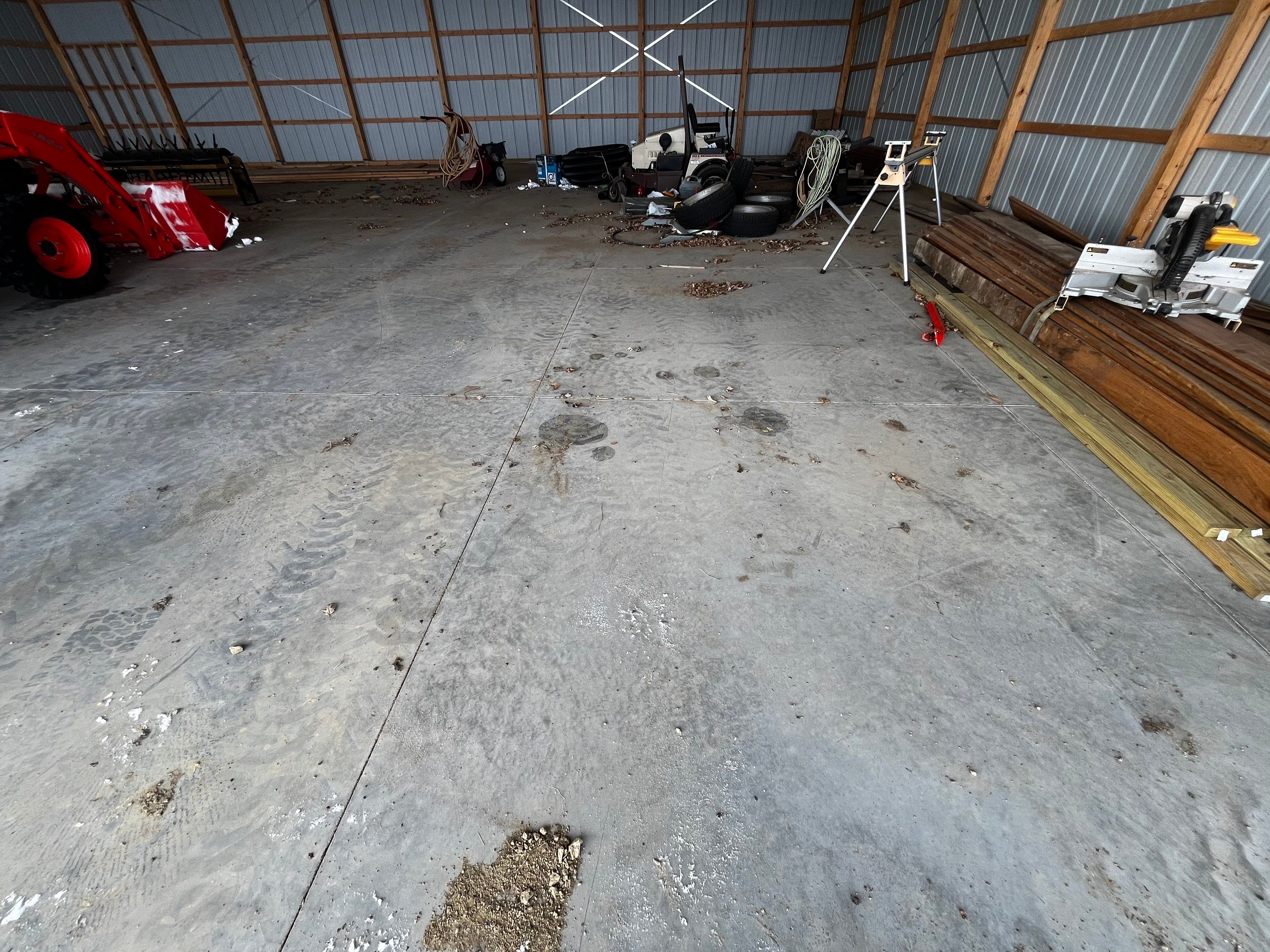 Durable Grey Speckled Epoxy Floor Coating for Yankton Shop by Select Painting, Coatings & Garage Cabinets