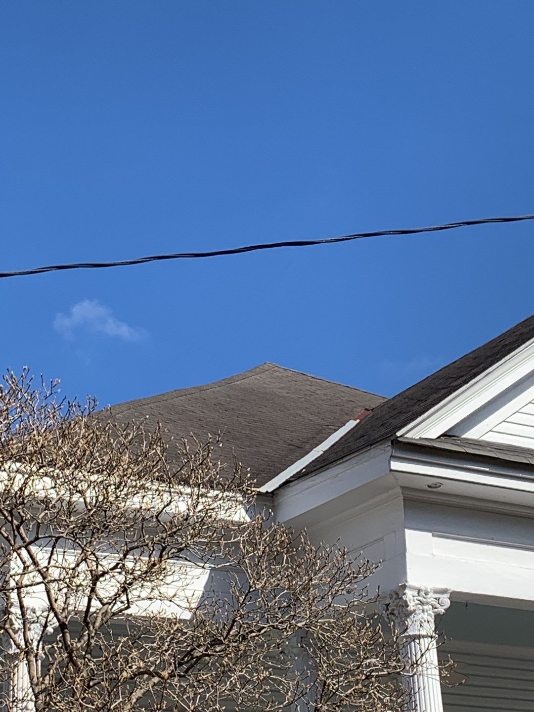 Residential Roofing Installation using Roof Replacement by American Roofing & Construction LLC