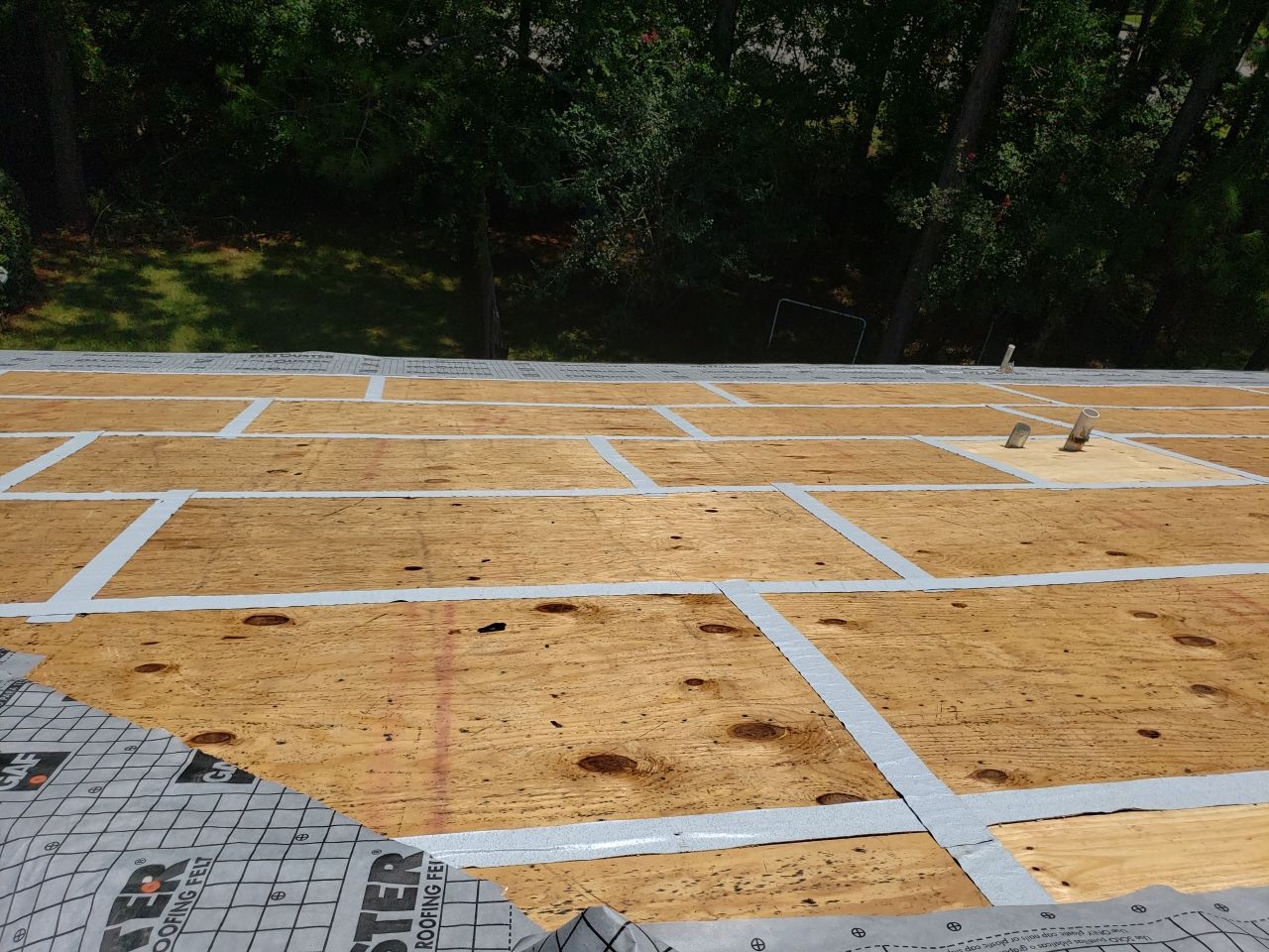 Residential Roofing Installation using Roof Replacement by American Roofing & Construction LLC