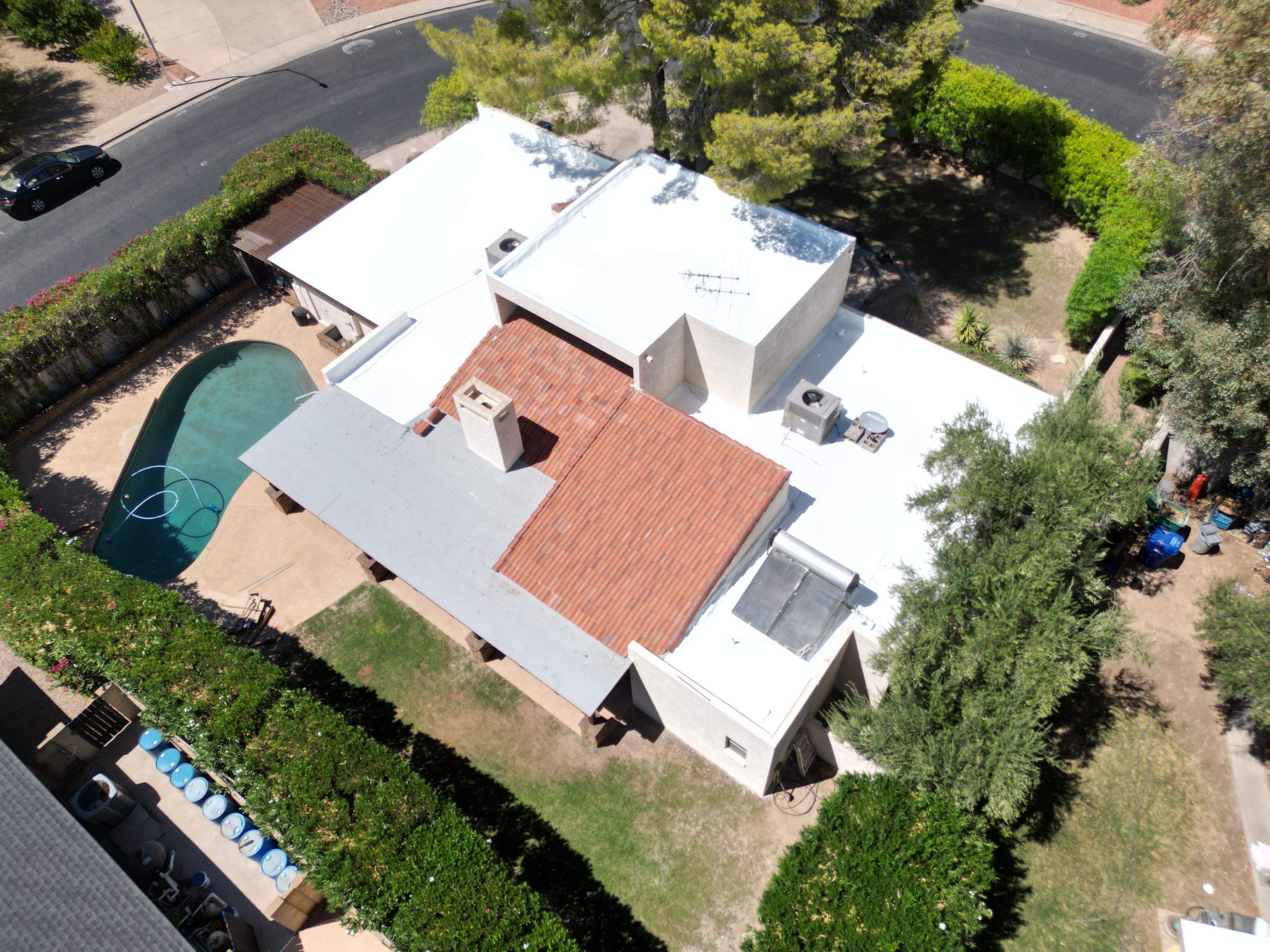 Re-coat & Tile Job by All Storm Roofing & Construction