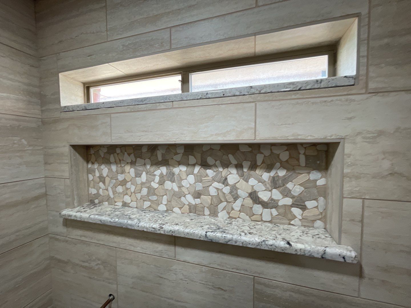 Bathroom Shower Remodel for a client by First United Roofing & Construction