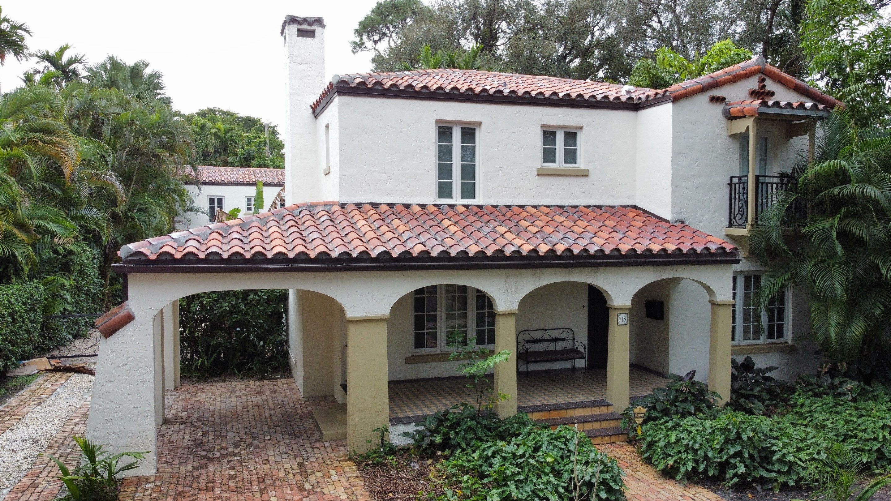 Residential Roofing Installation using Two Piece Clay Barrel Tile with a mortar set application by BOB HILSON & CO INC