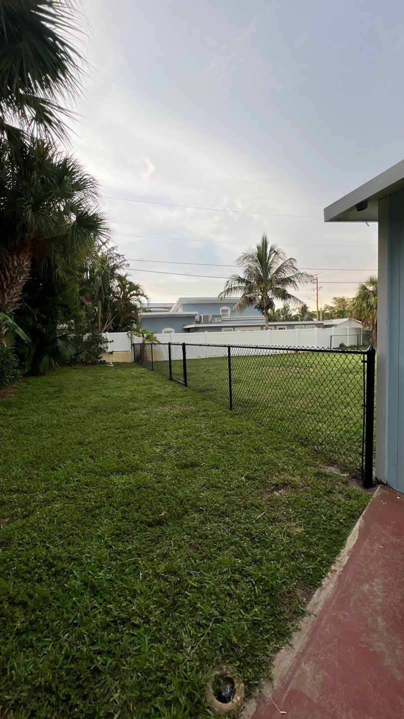 Holmes Beach, FL 4ft. Tall Black Chain-link  by Asap fence and gates, LLC